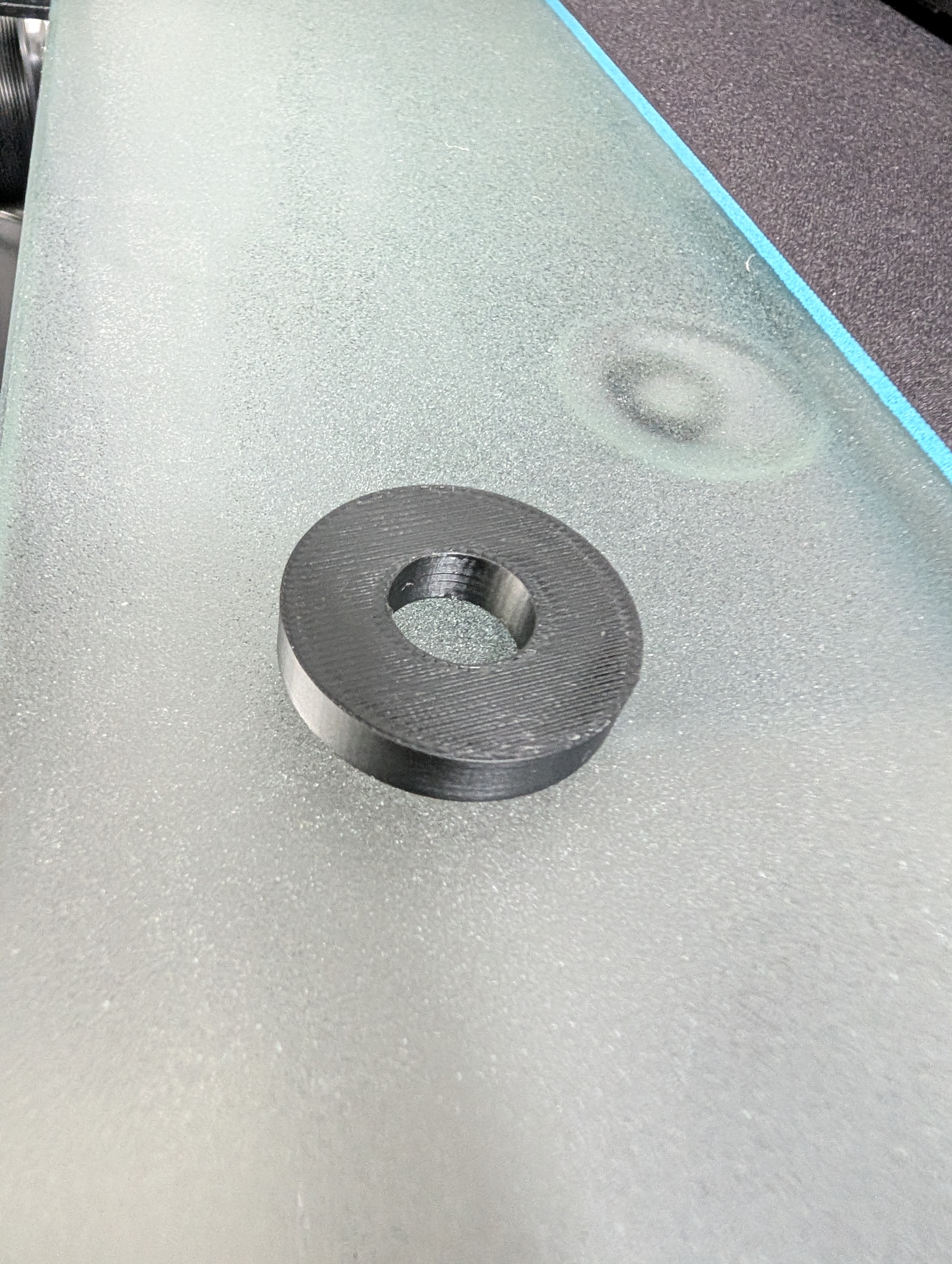 Load cell pedal back washer