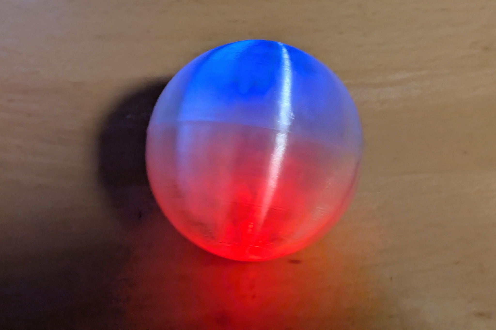 Flashing ball with vibration sensor