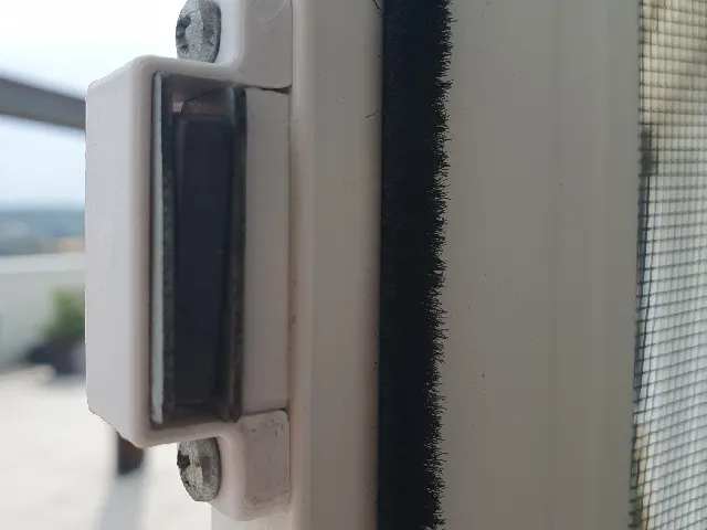 Door magnet holder