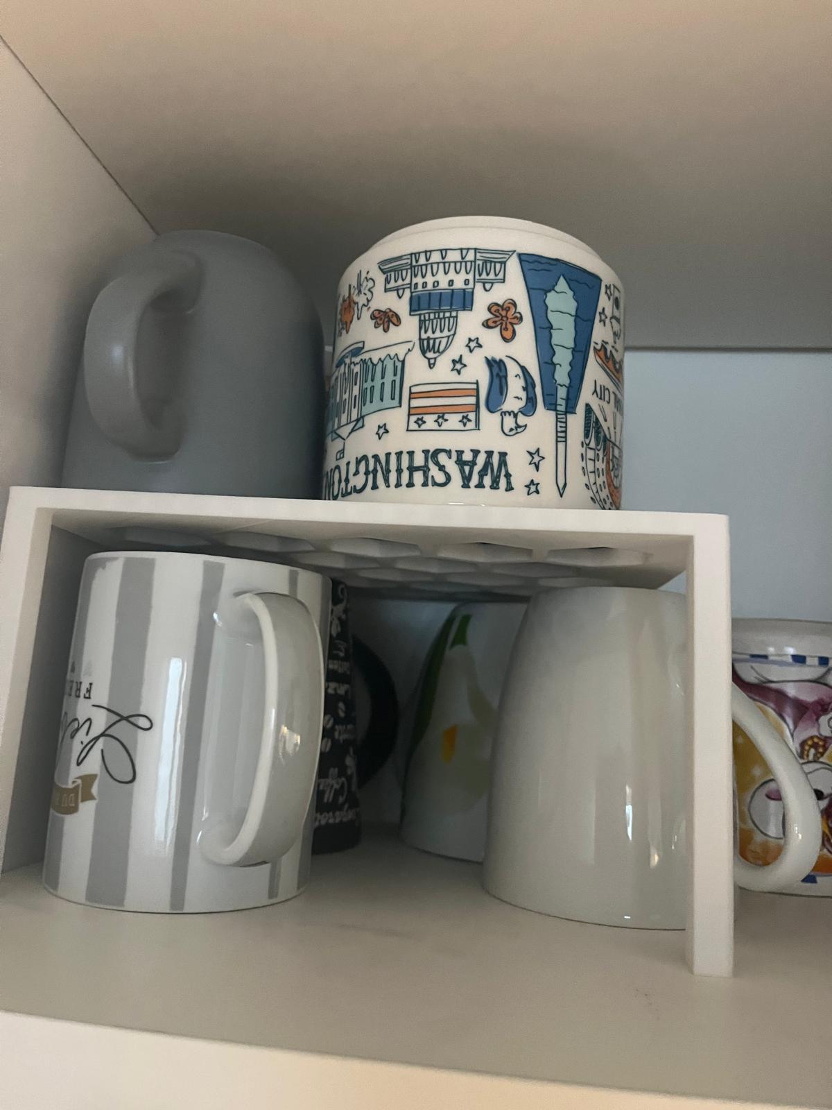 Kaffebecher Regal