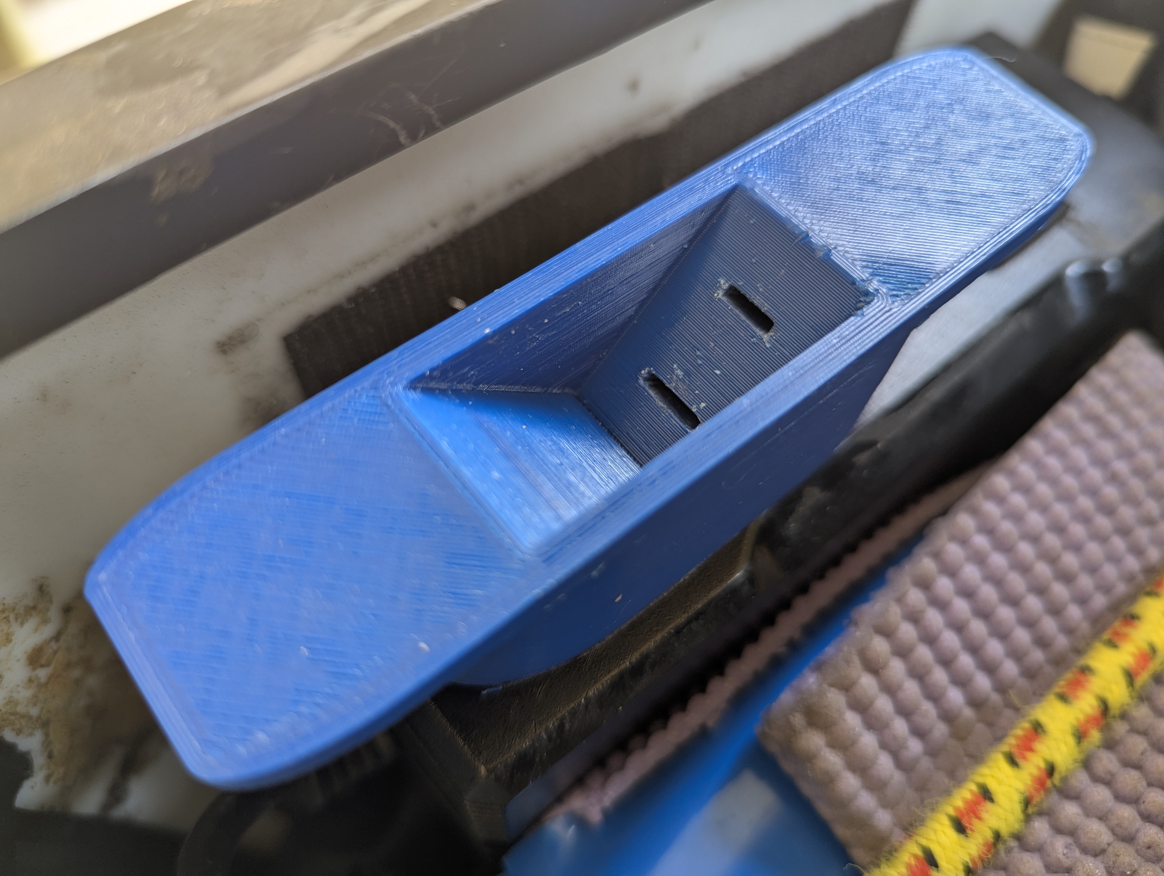 Cord Winder with Plug Storage