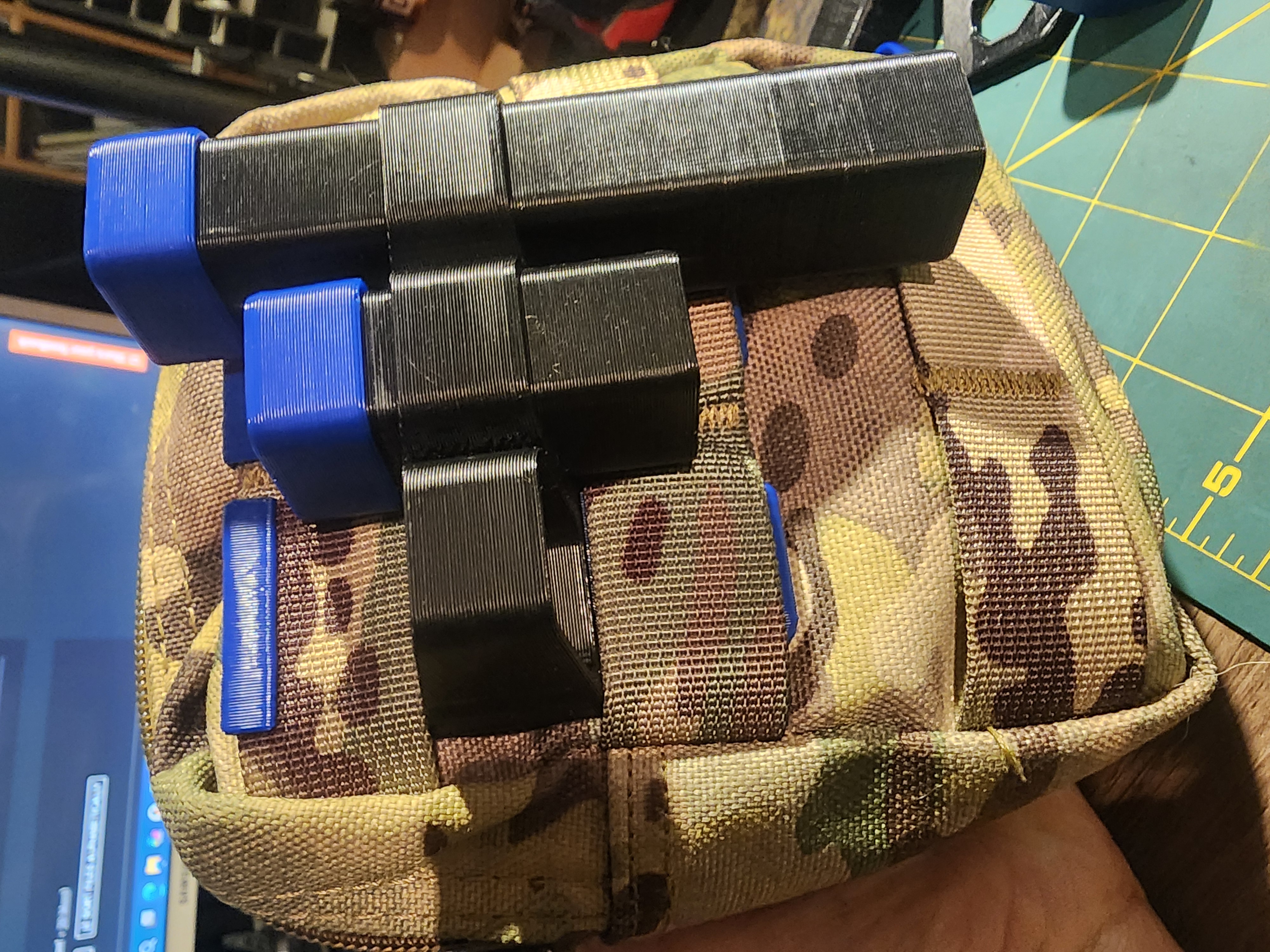 Slimline airsoft bb container and molle holder