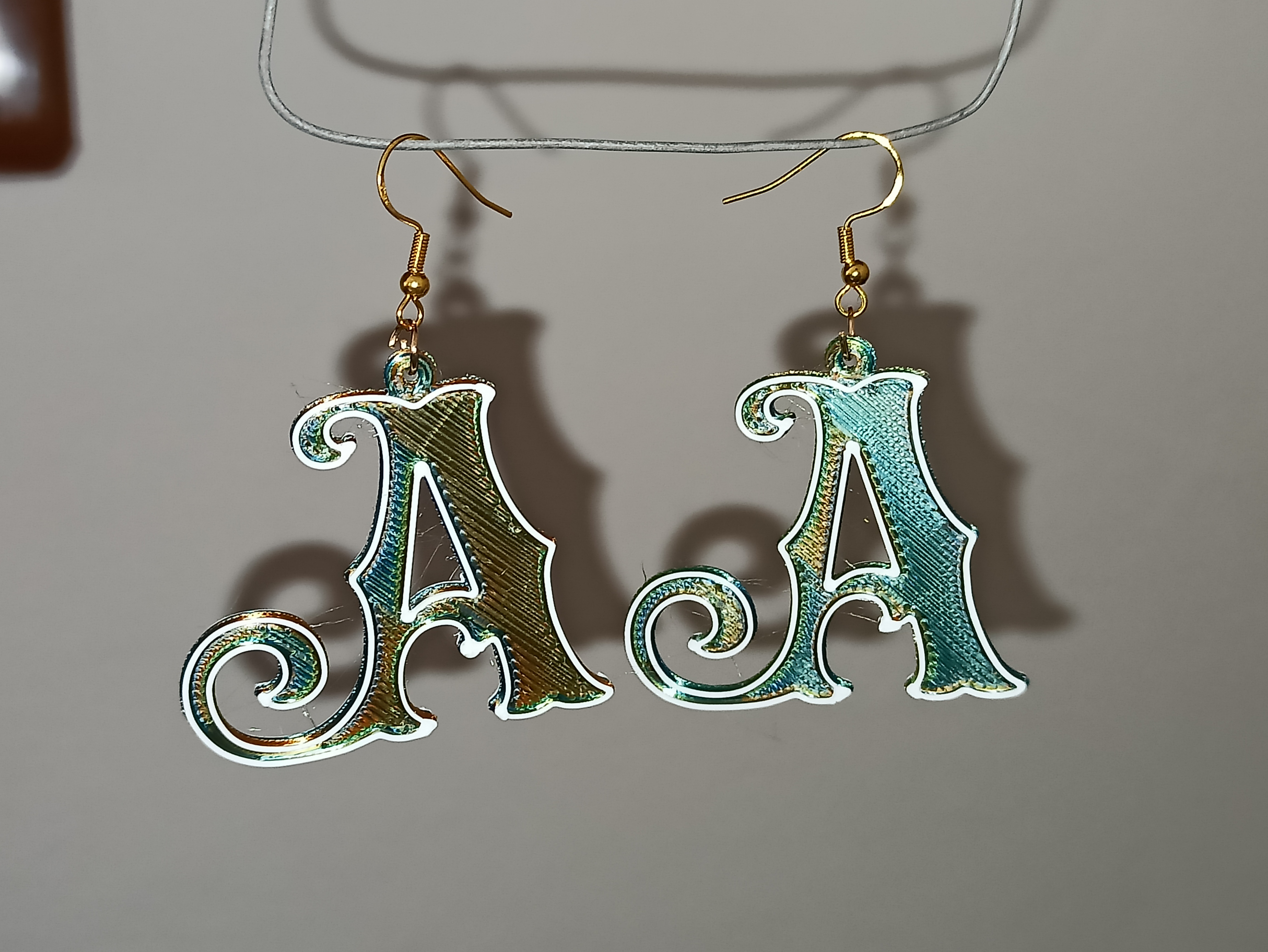 A letter earrings keychian