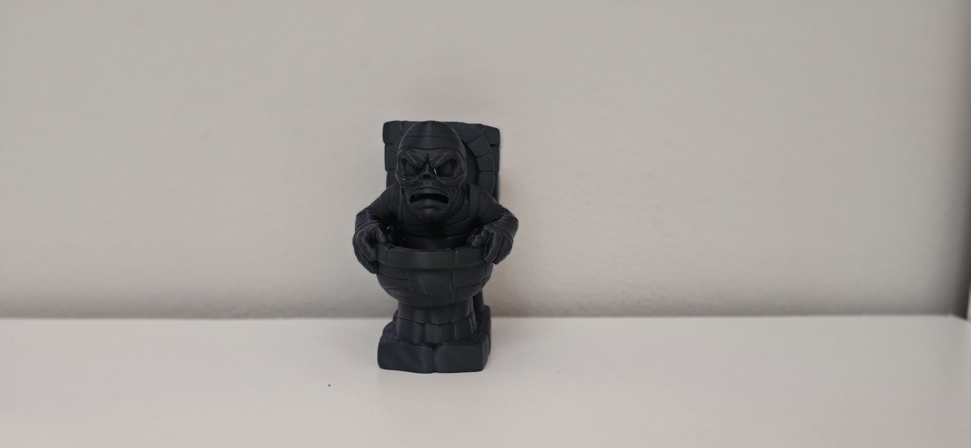 Angry Toilet Mummy – Dark Halloween Humor