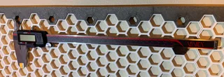 Compact Sideways Caliper Mount for Honeycomb Storage Wall