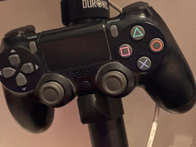 Holder for pad ps4 on 32mm monitor stand leg
