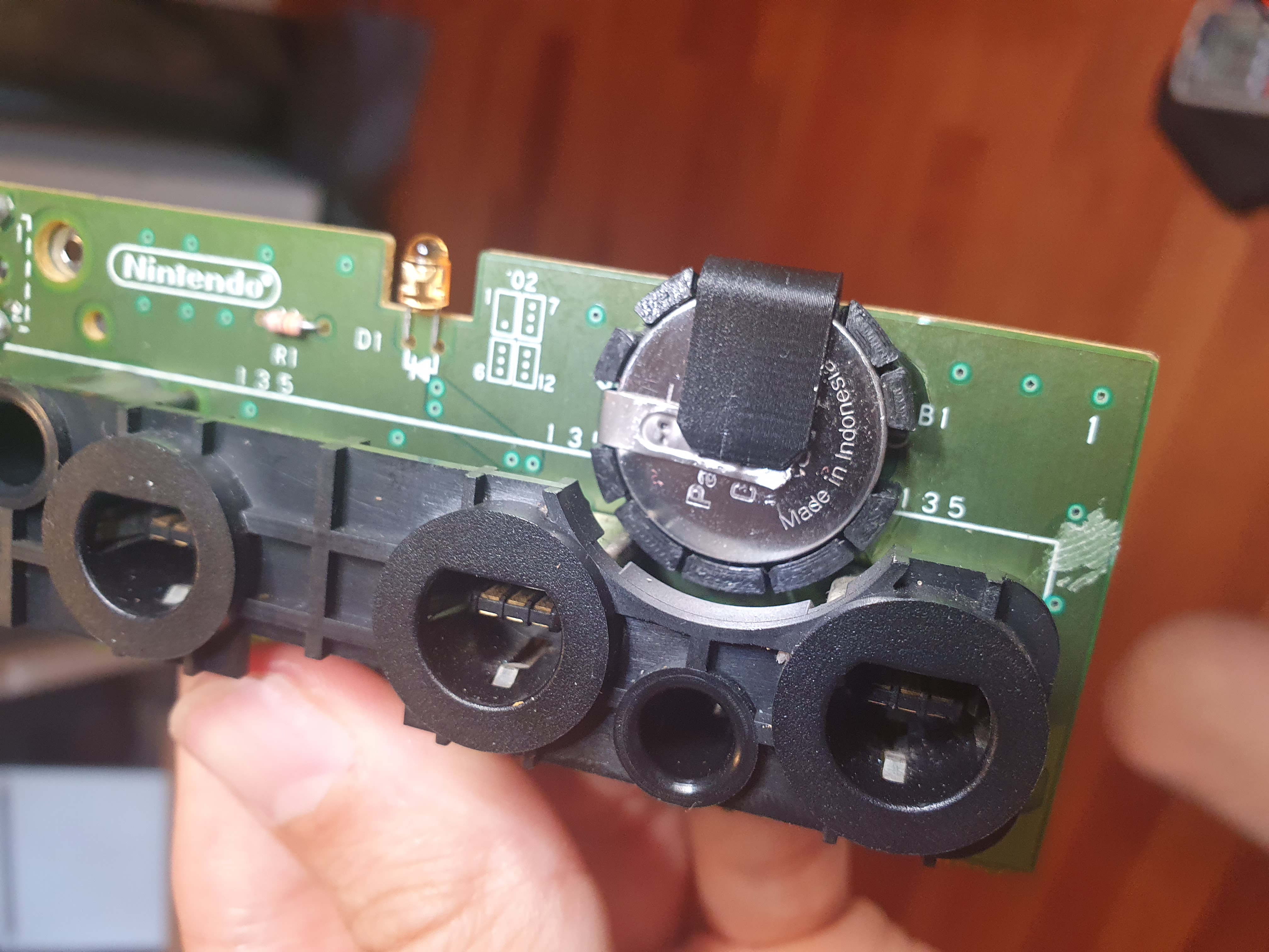 Gamecube CR2032 battery replacement holder