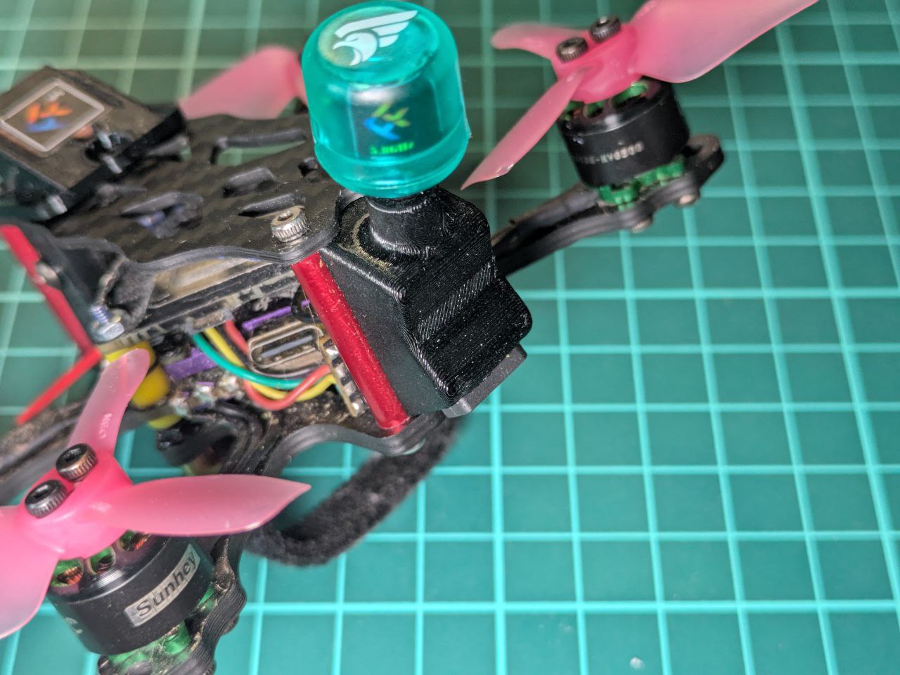 Antenna and battery connector mount