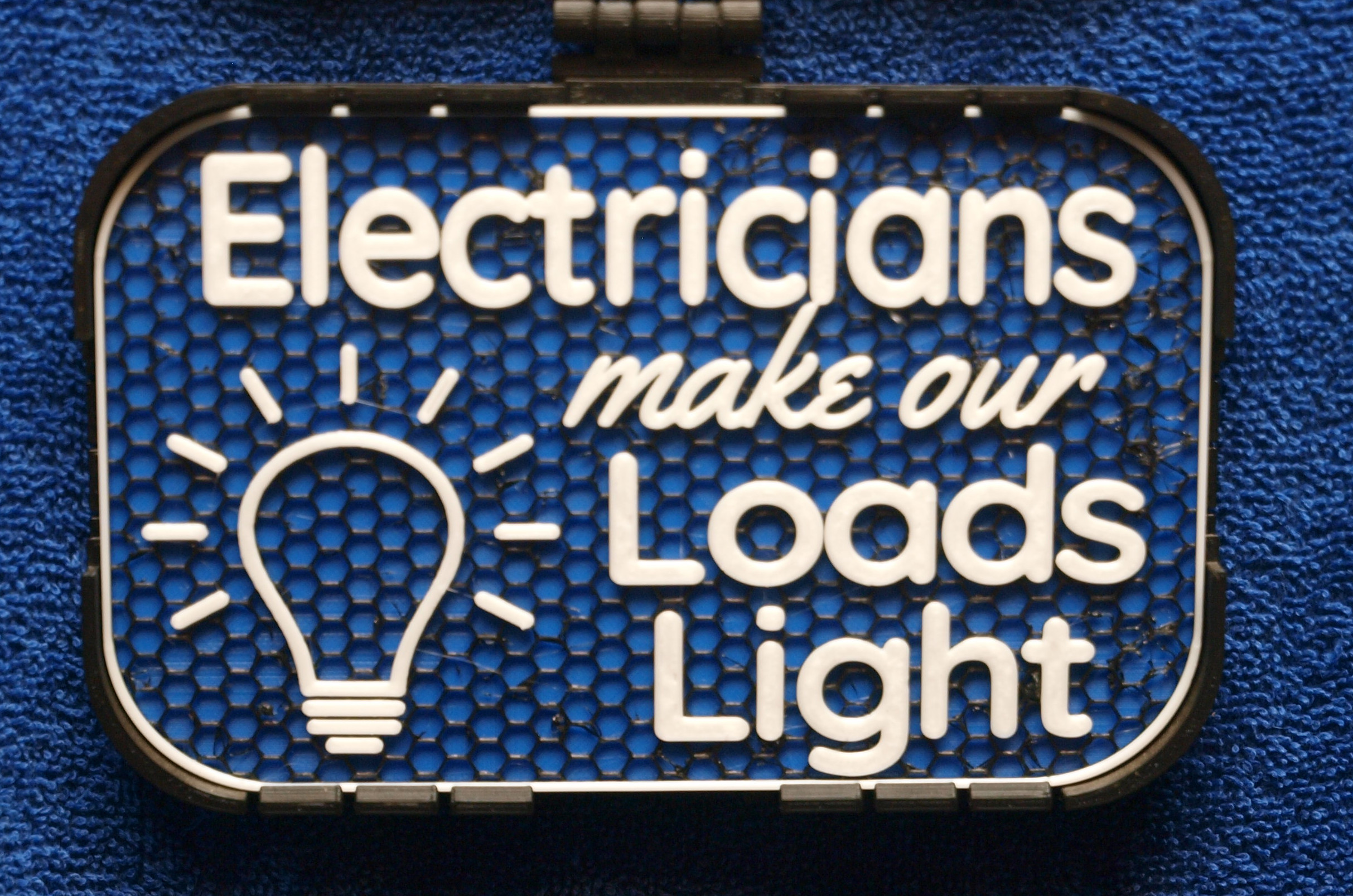 Electricians make our Loads light sign