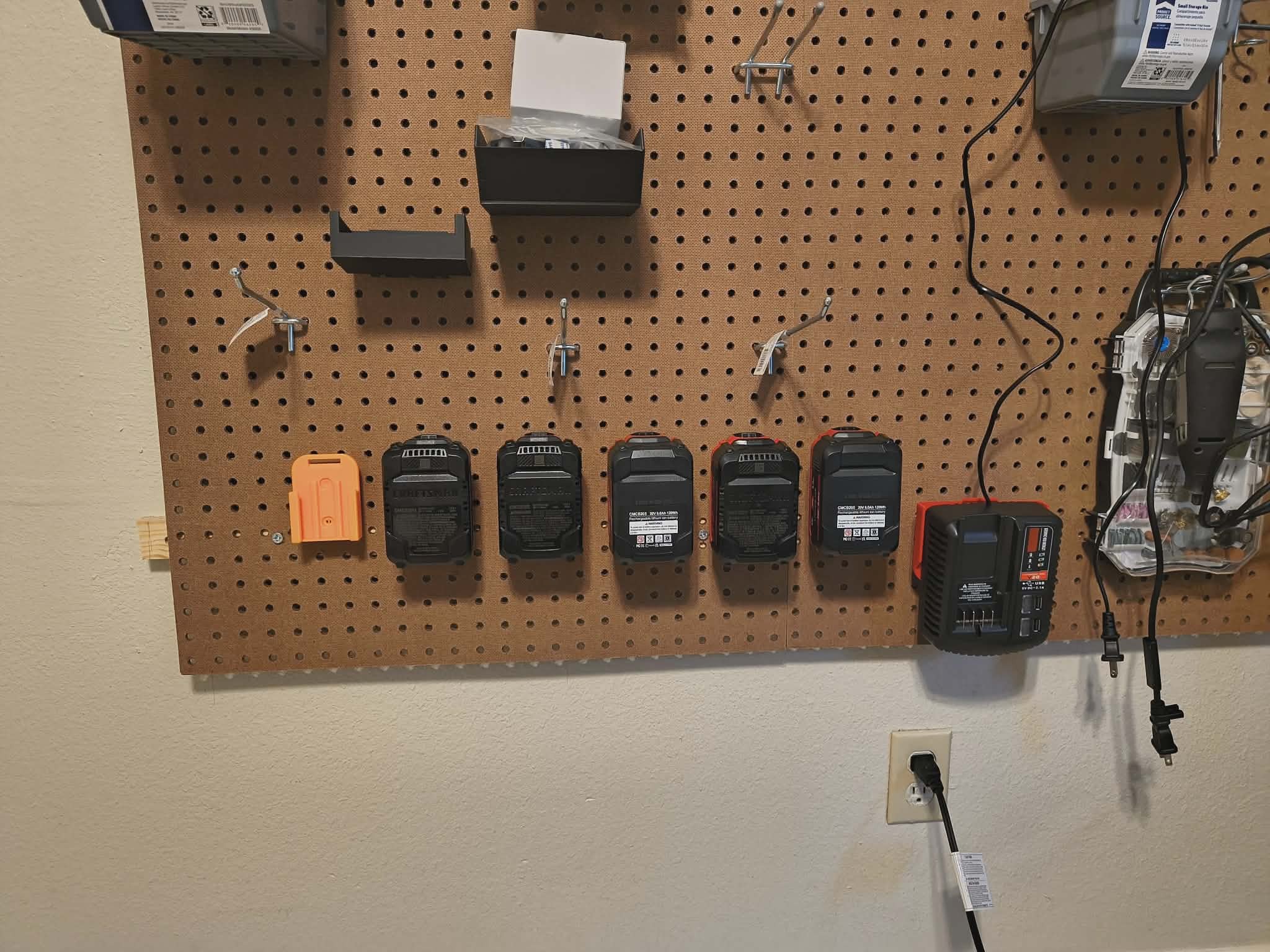 Craftsman battery peg board mount.