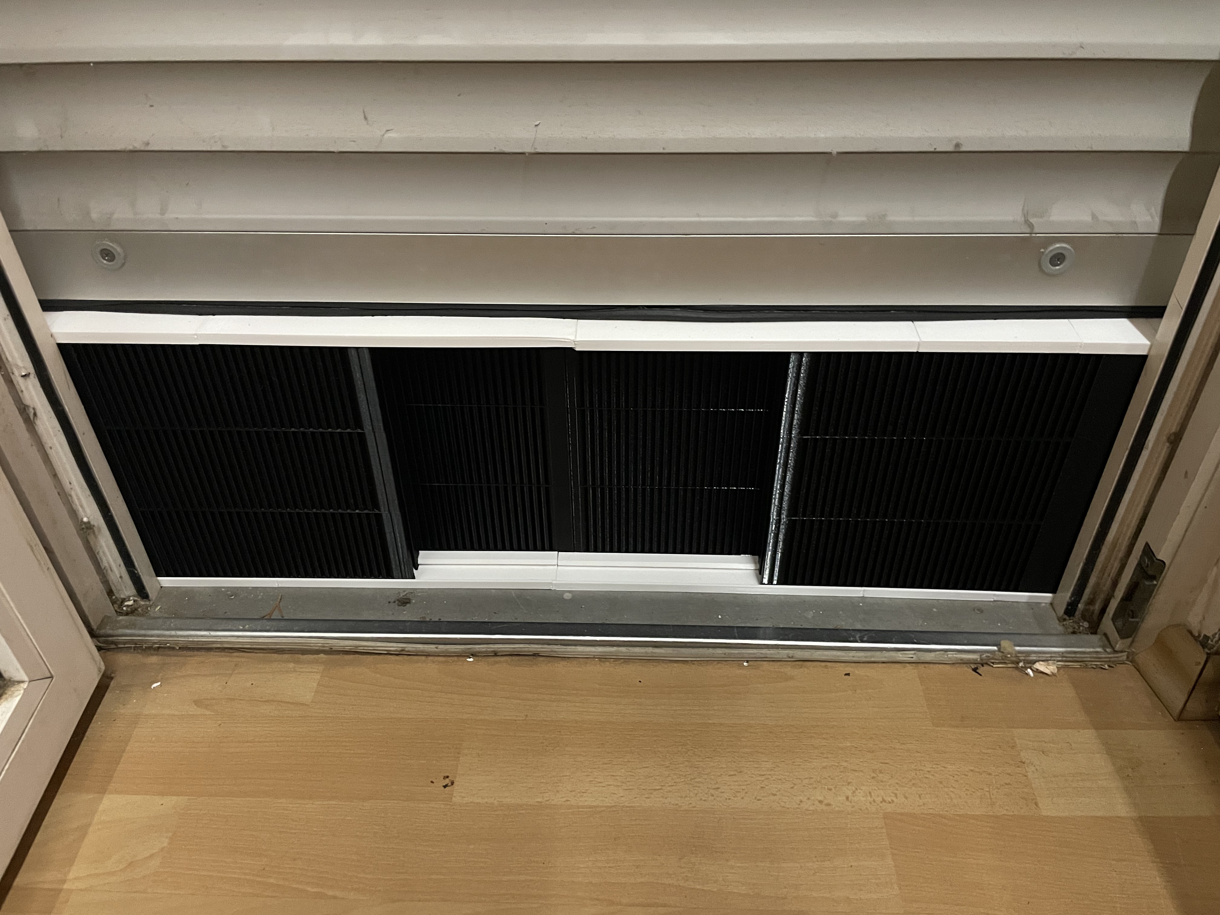 BreezeShade - window insert that allows airflow but keeps all light out
