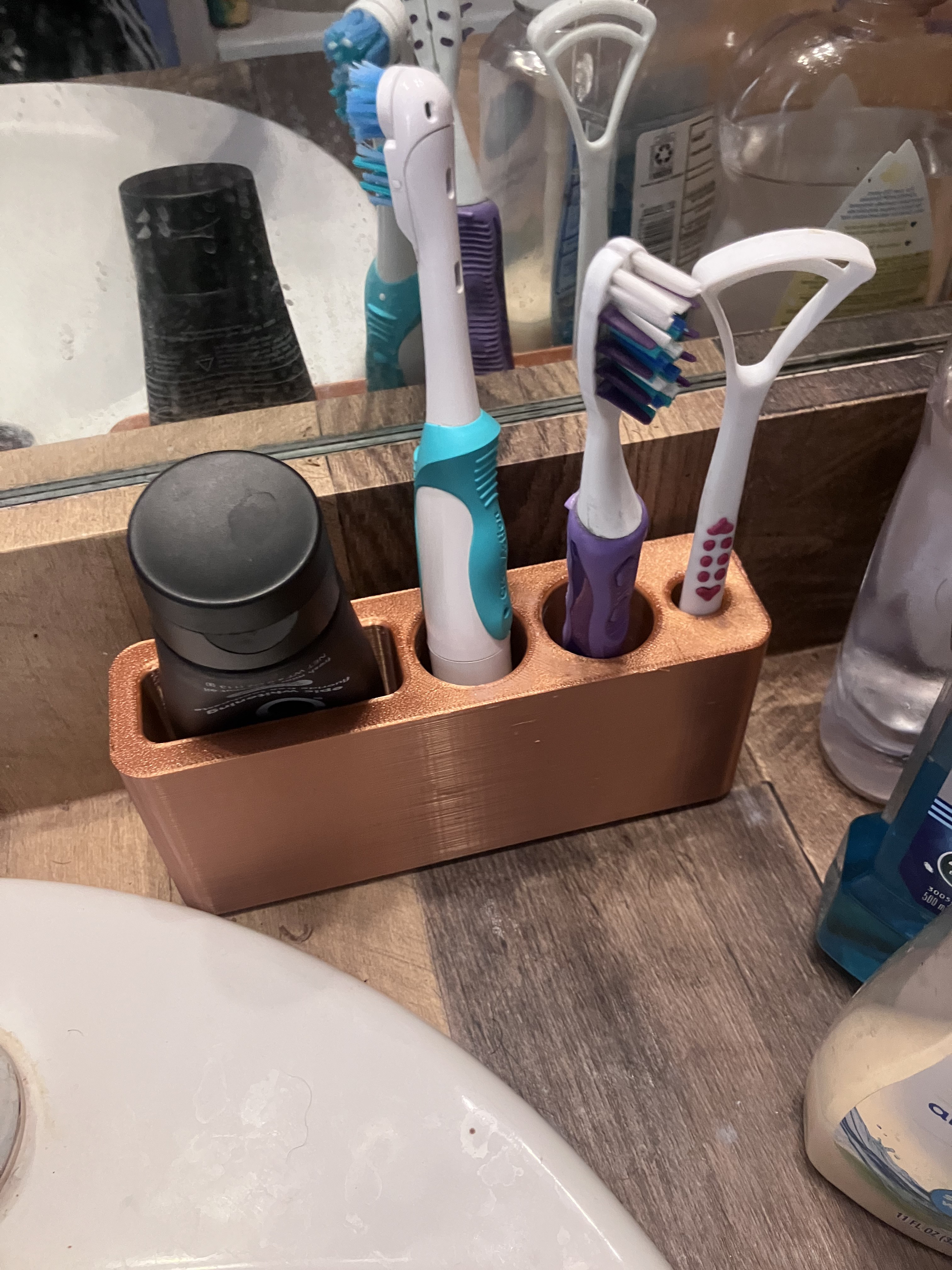 Toothbrush holder for two + tongue scraper
