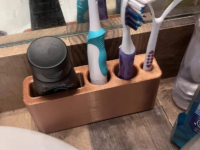 Toothbrush holder for two + tongue scraper