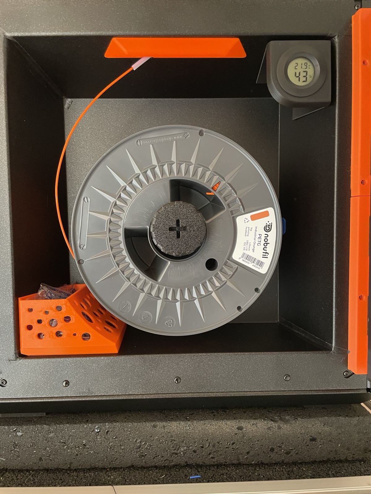 Hygrometer holder and silica gel container for CoreOne