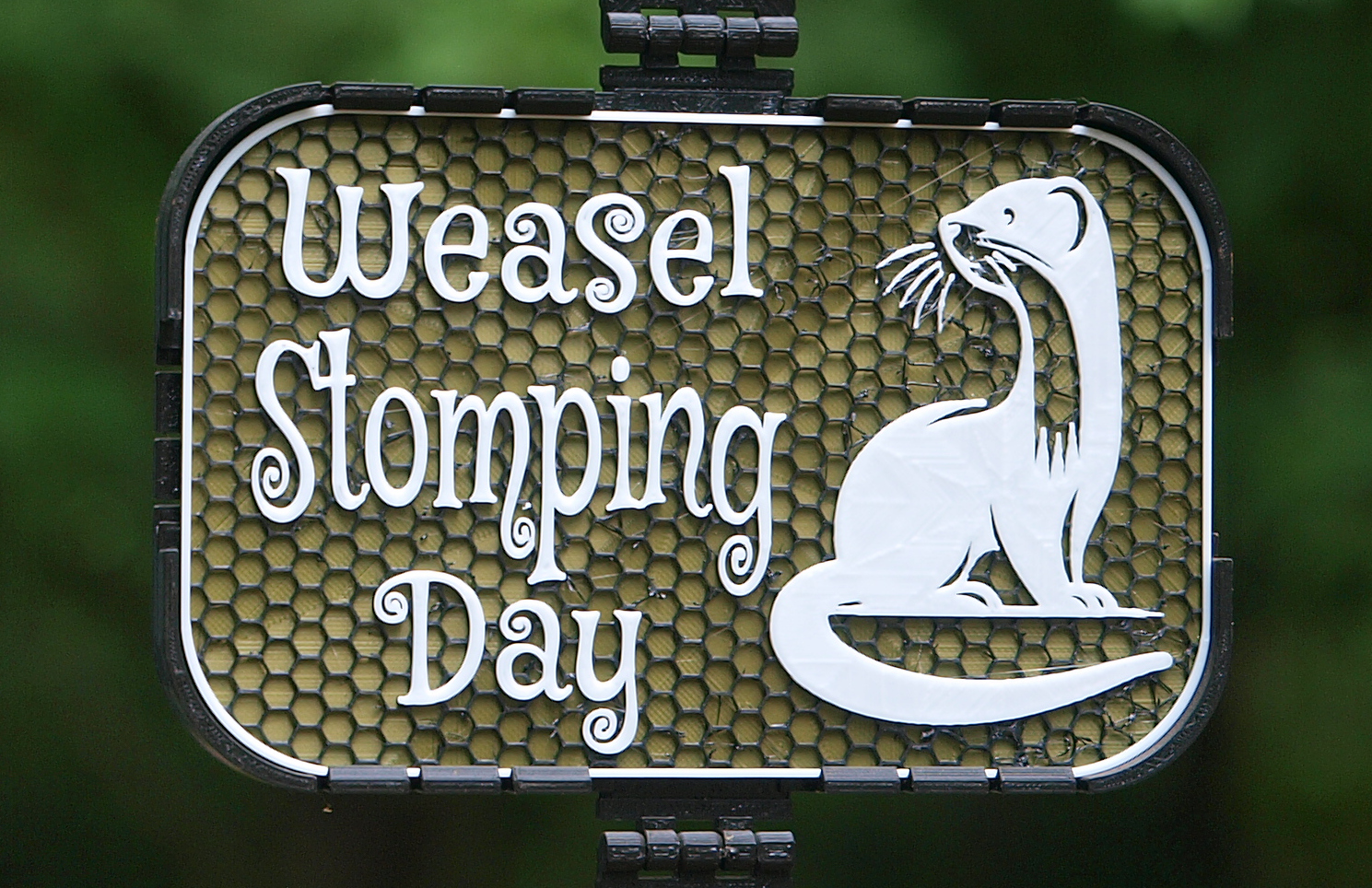 Weasel Stomping Day sign