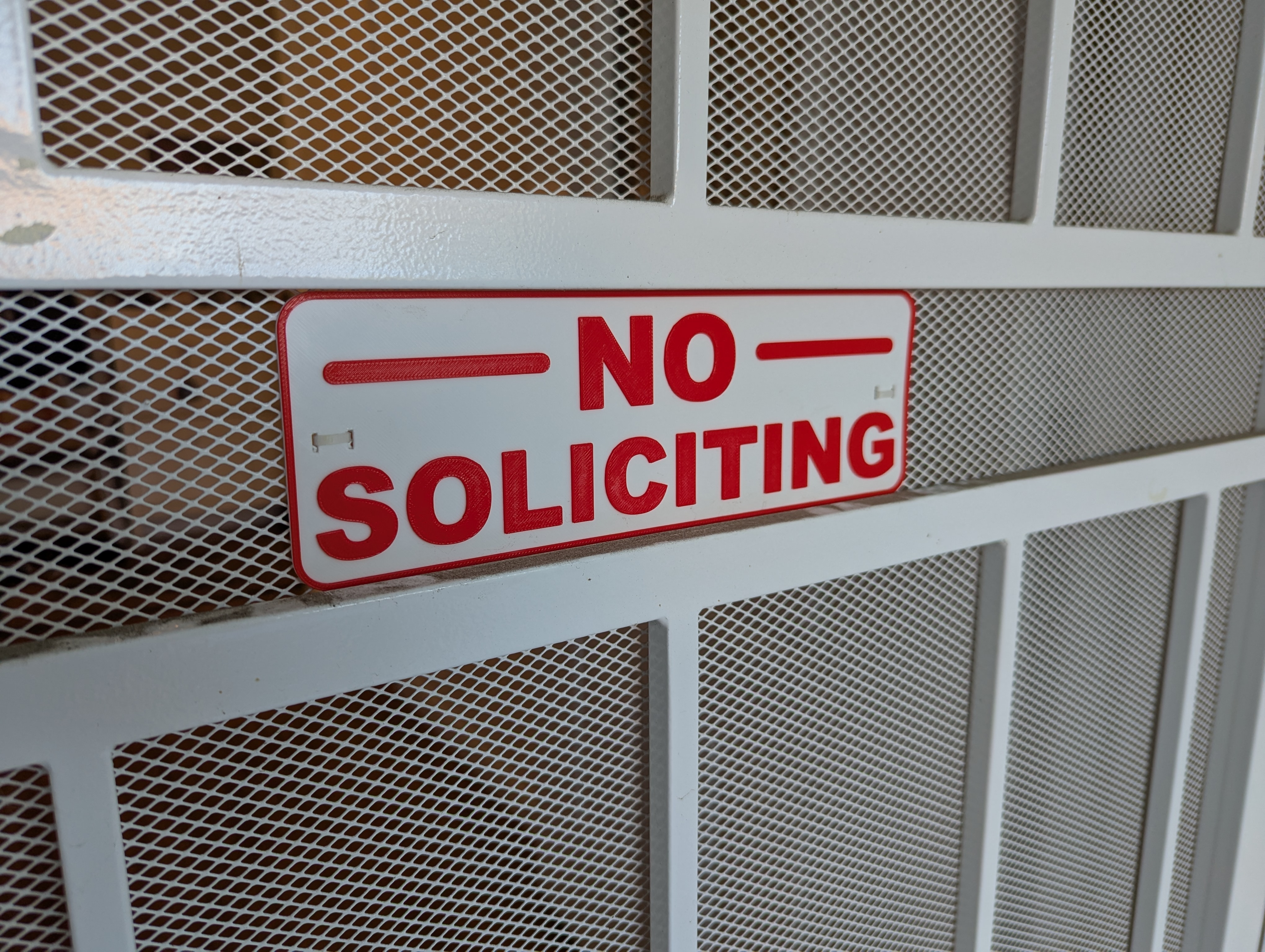 No Soliciting Sign with zip-tie slots