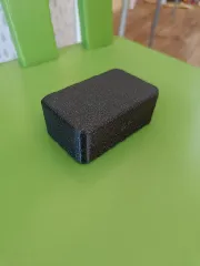 Box with hinged lid and "H" logo