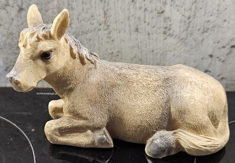 Sitting donkey nativity scene