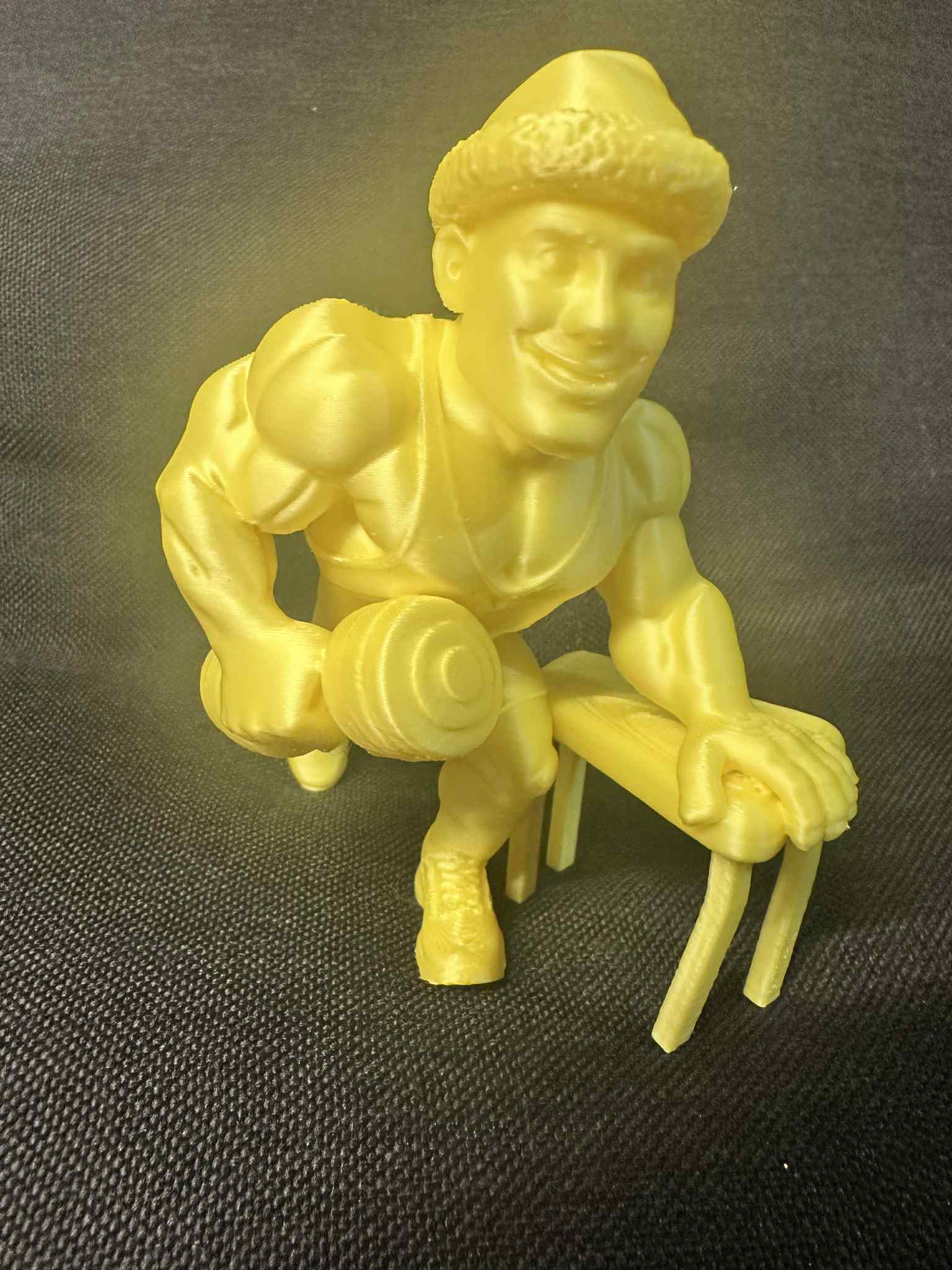 Christmas Masculine Gym Champion with Dumbbell Figurine