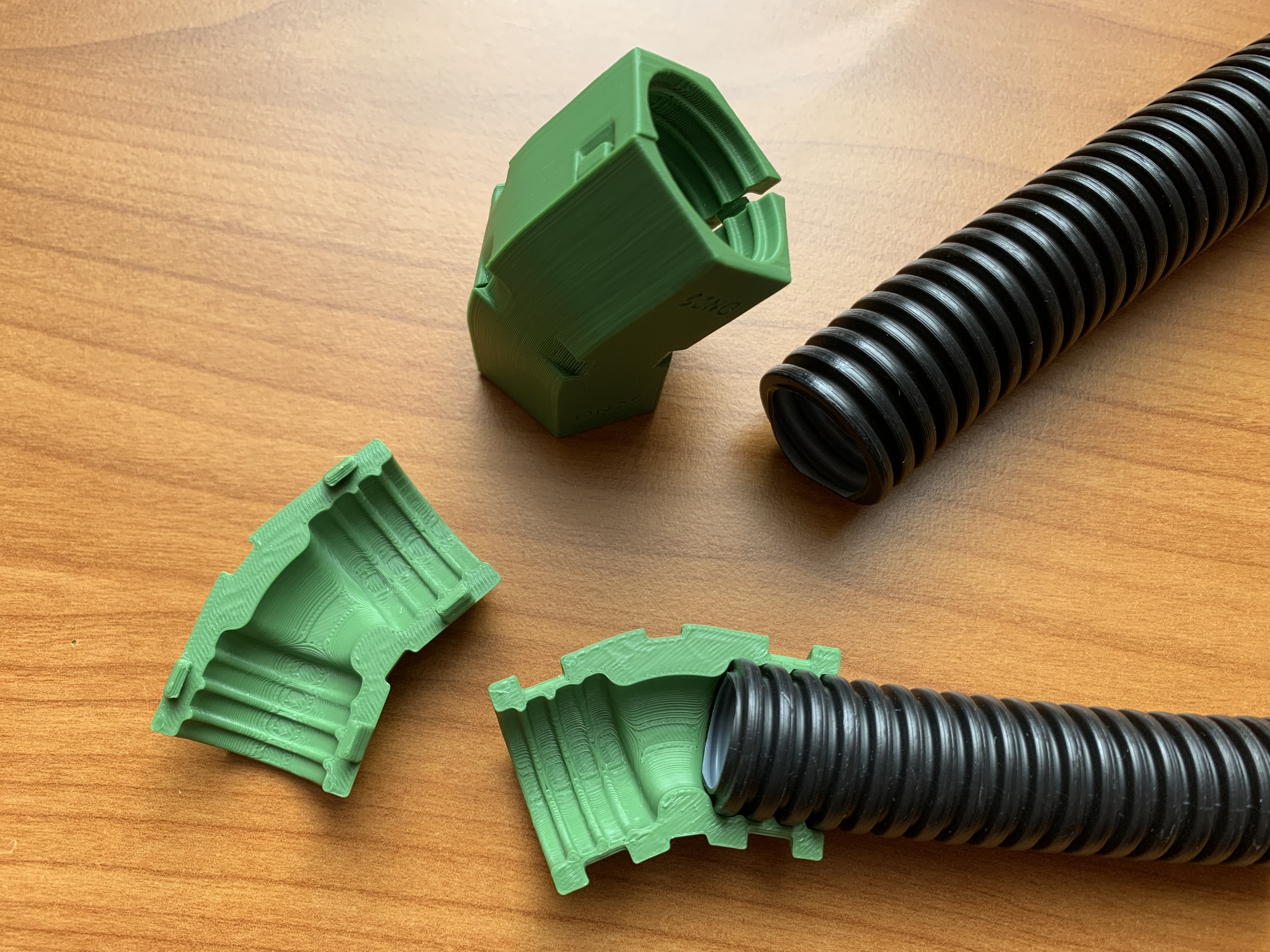 Angled corrugated condiut connectors