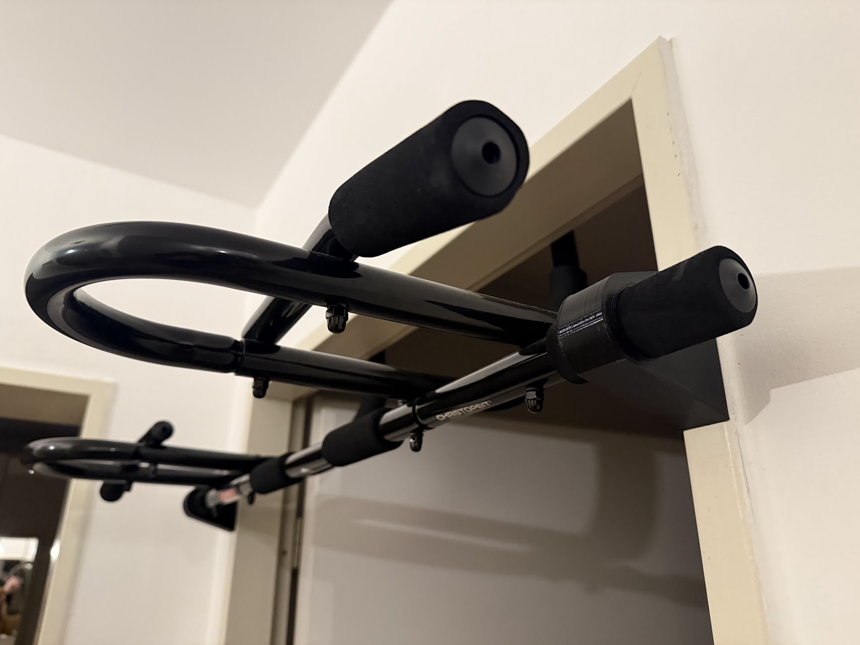 Pullup bar door frame spacer