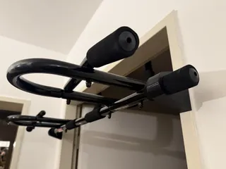Pullup bar door frame spacer