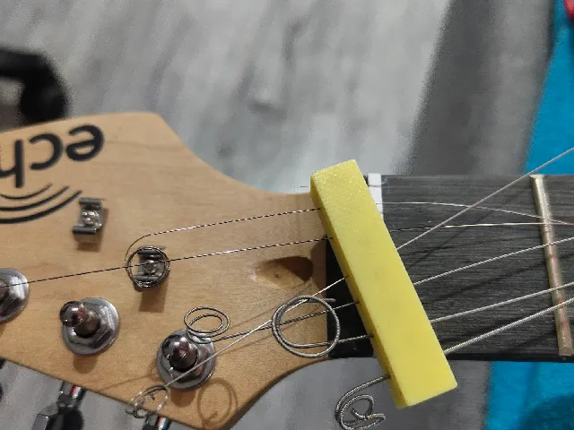 Guitar string holder for maintenance - customizable