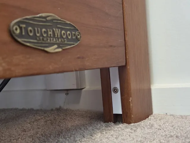 Touchwood cot rail stopper