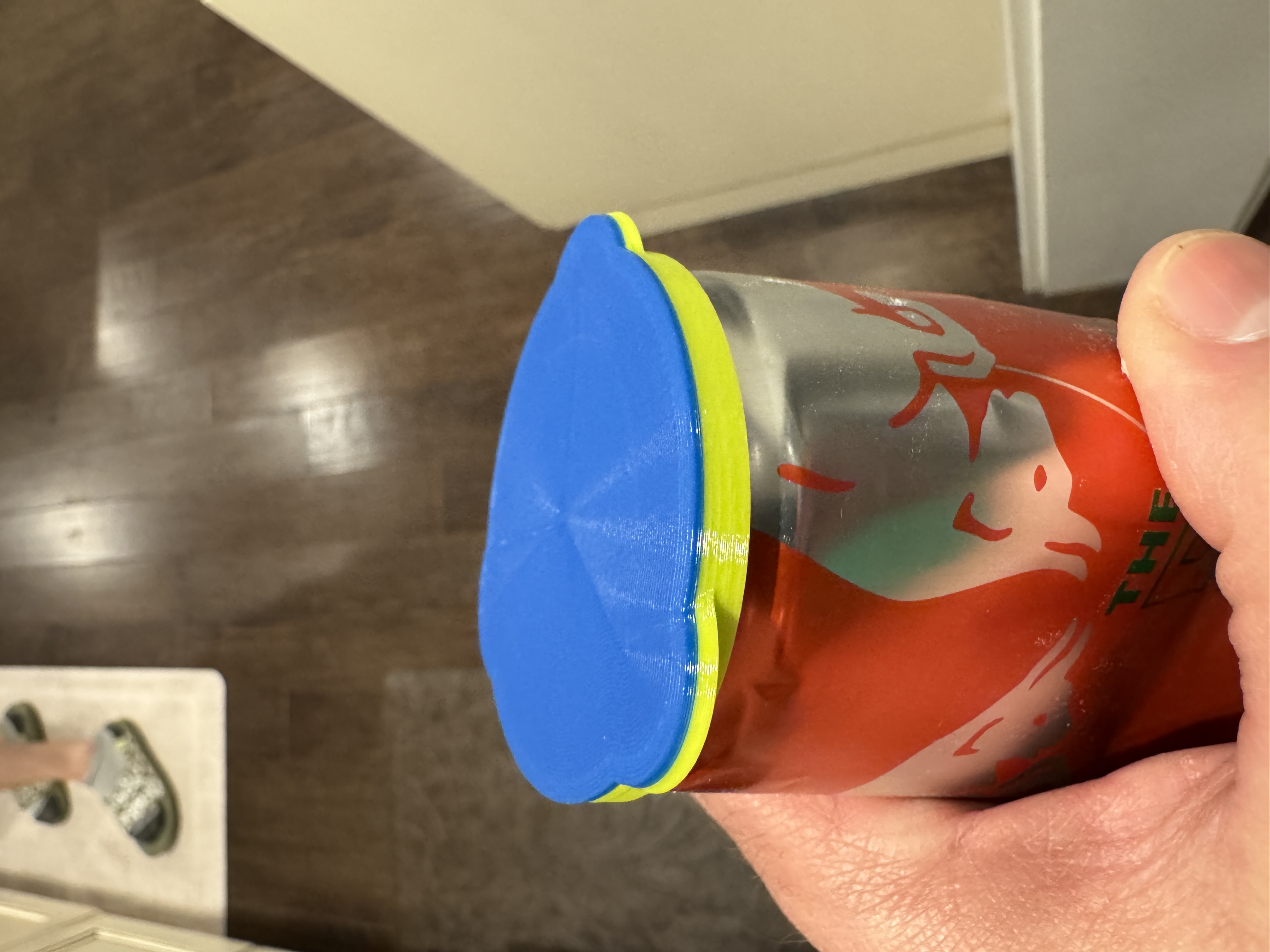 Red Bull and Celsius can lid