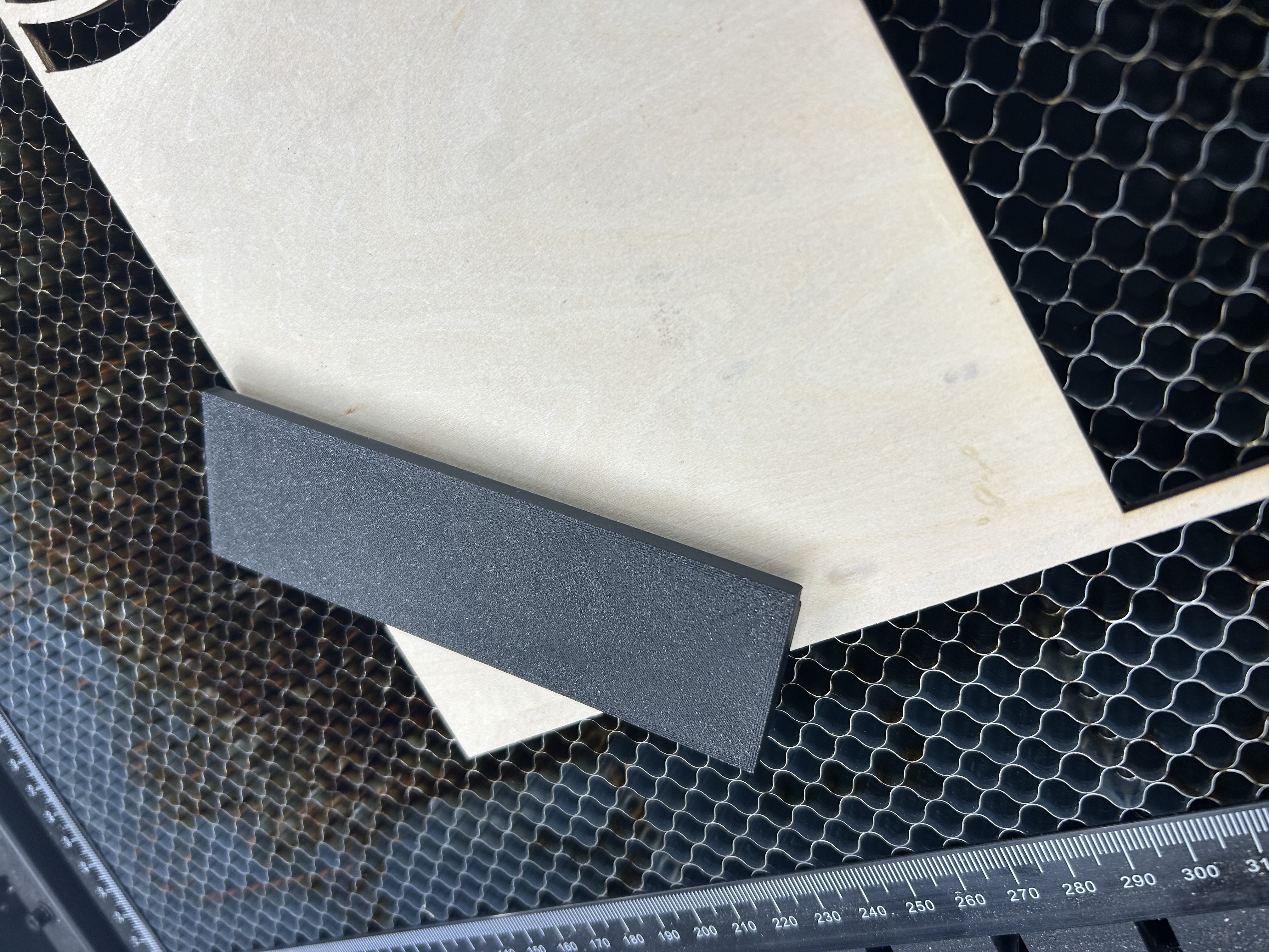 Magnetic material hold down