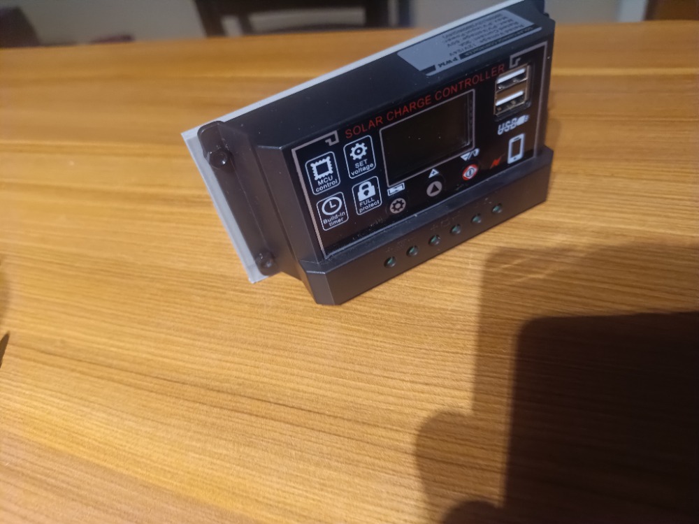 Solar charge controler holder