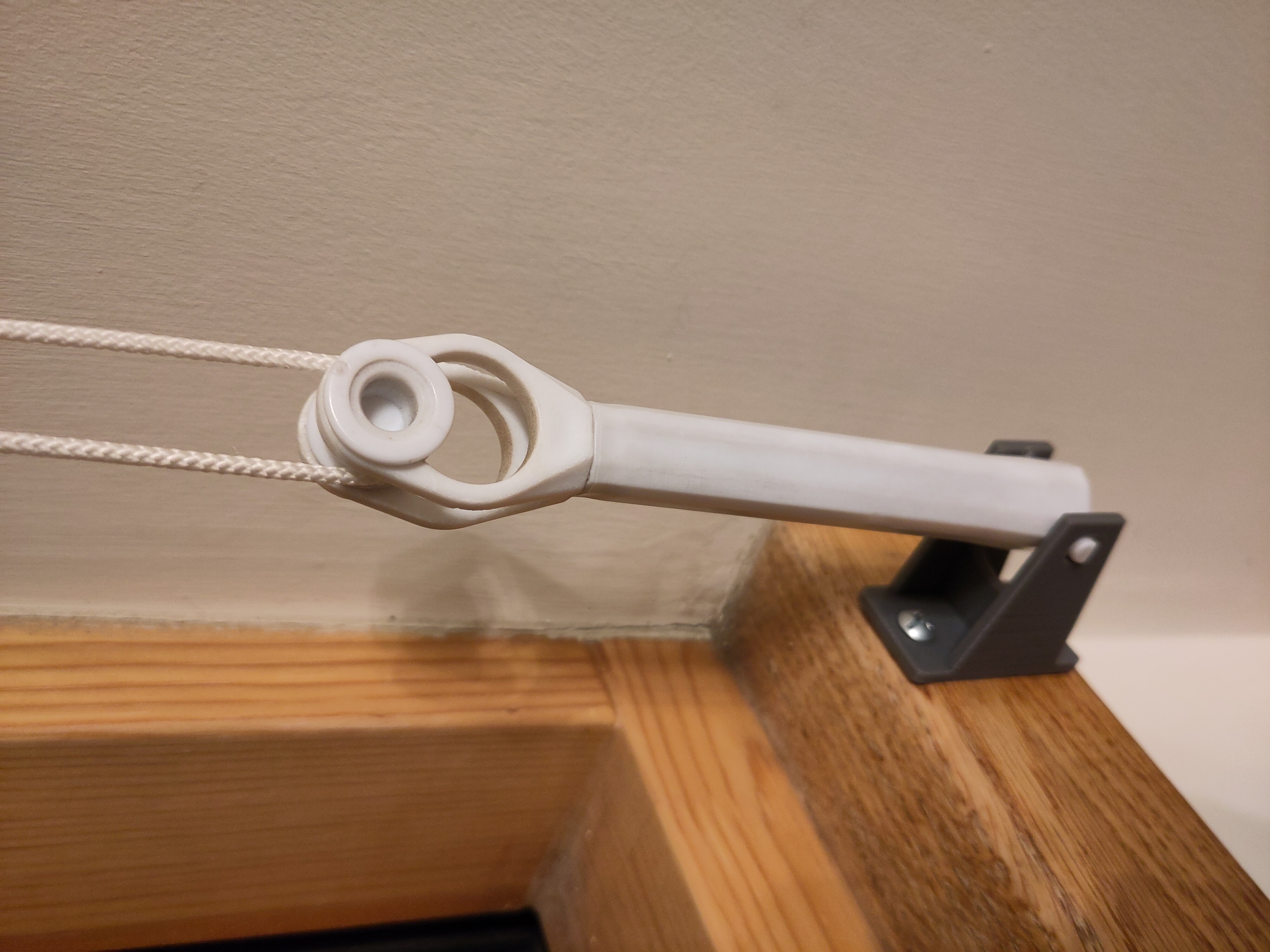 Curtain pulley holder