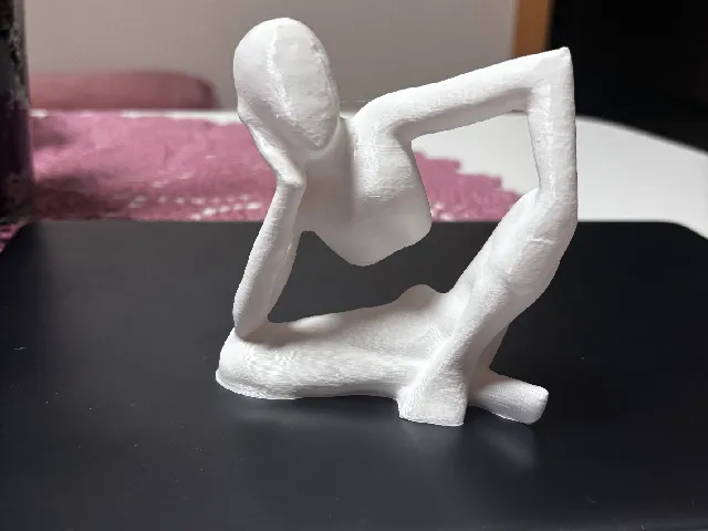 Abstract Seated Figure Sculpture