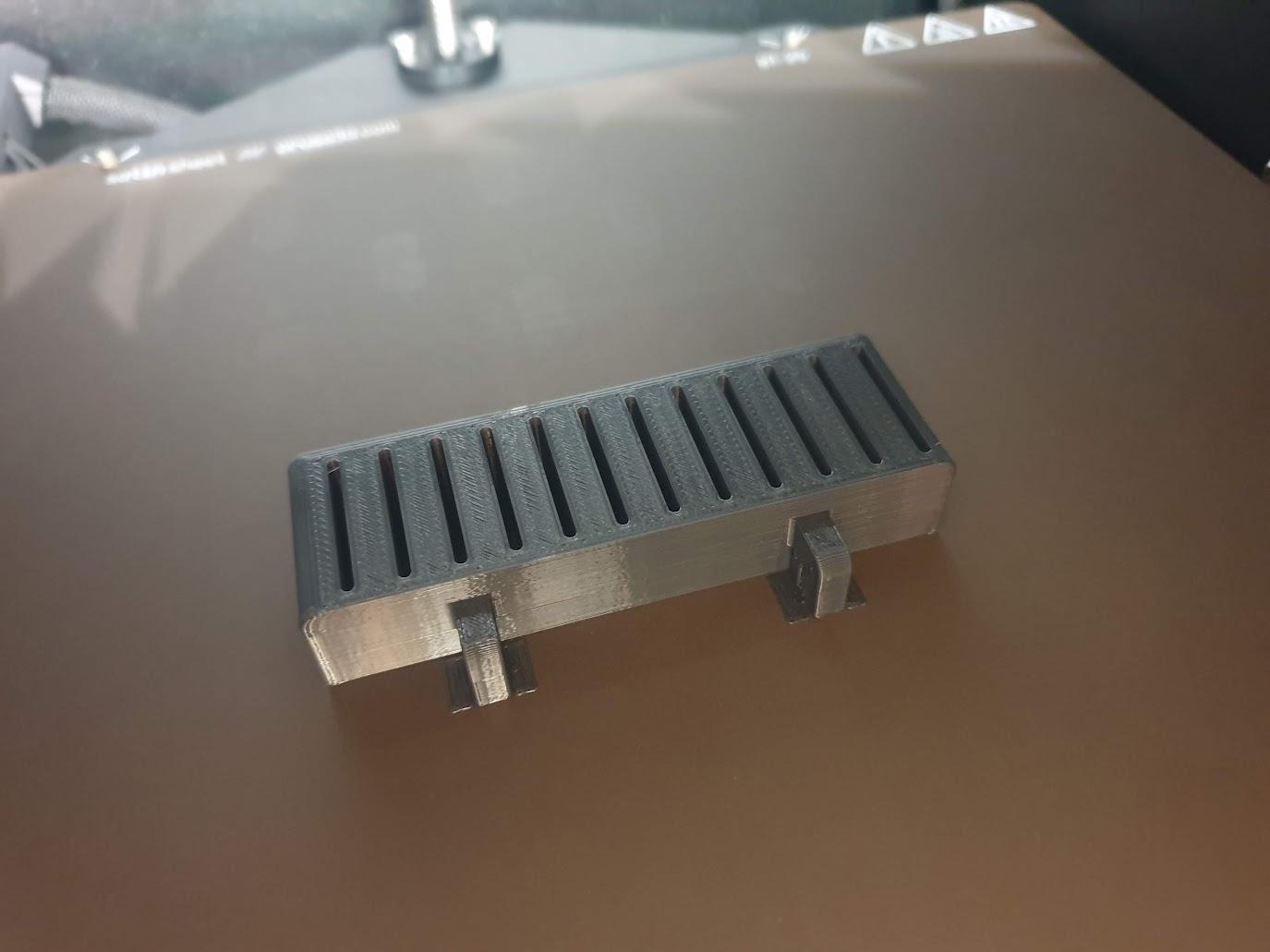 Filament Clip Holder for SKADIS Panel - 12x Clip Remix by Grogg3D [Updated]
