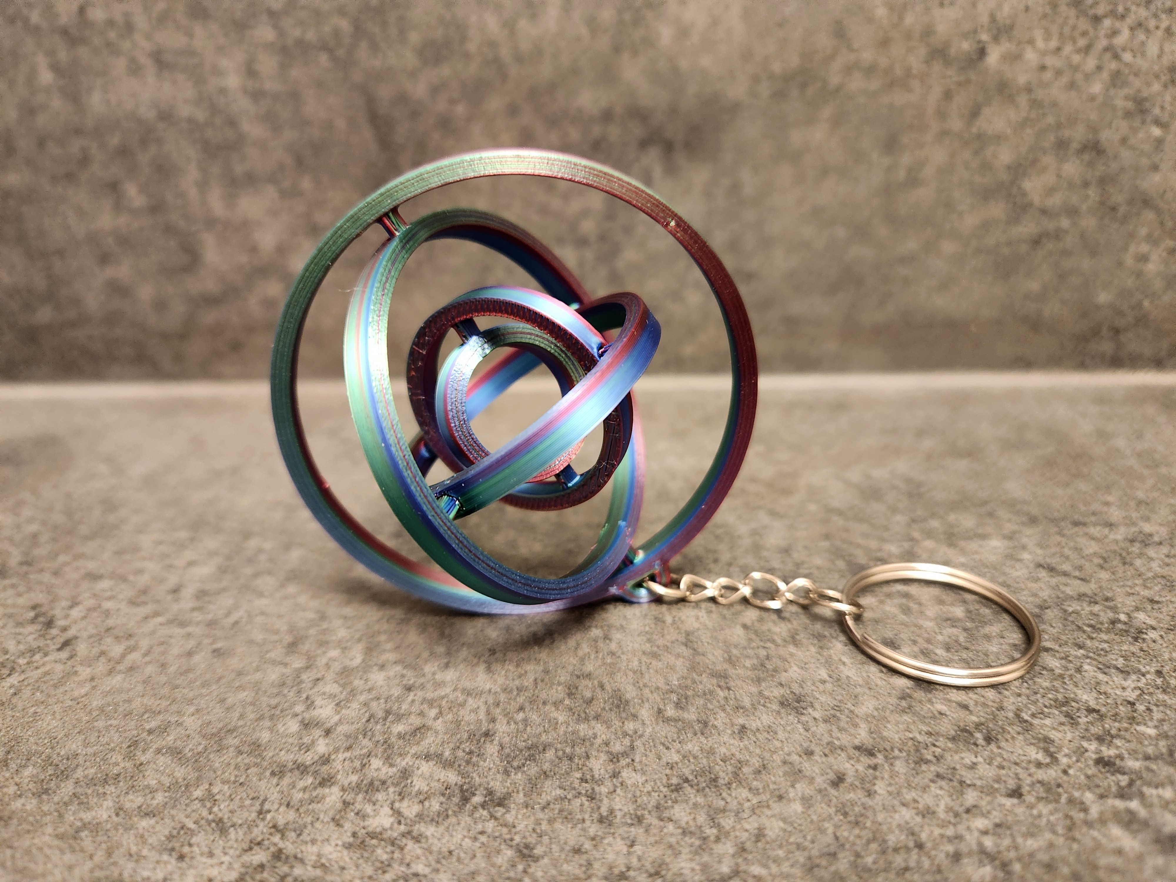 Rotating rings fidjet Keychain.