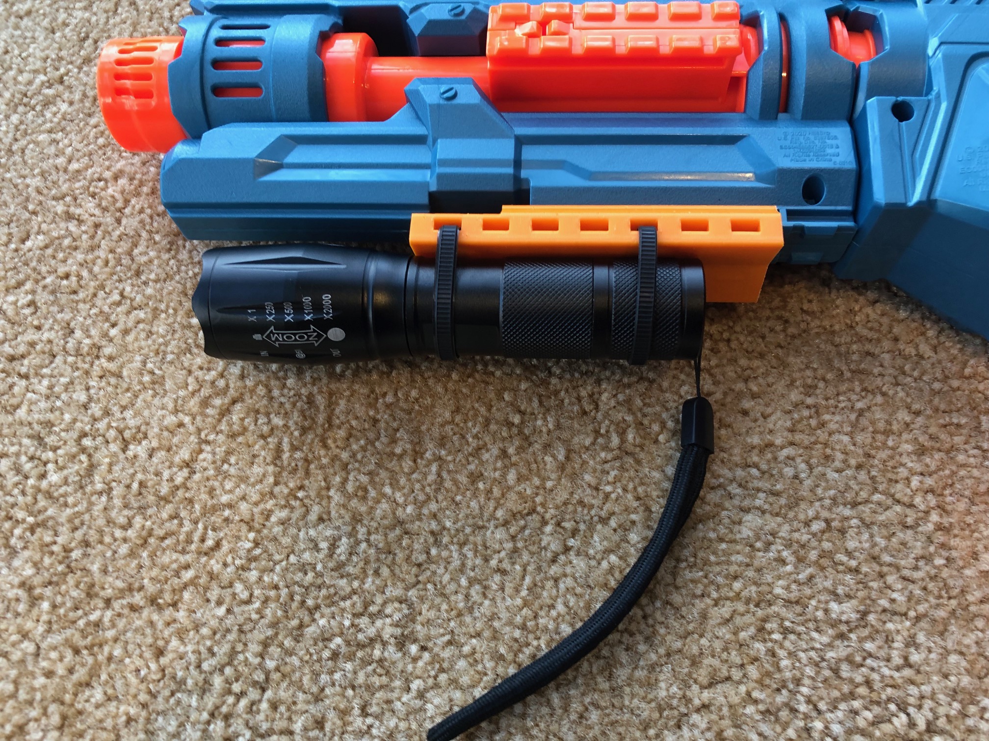Nerf flashlight holder