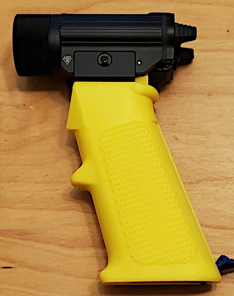 Pistol Grip with a Rail for Light