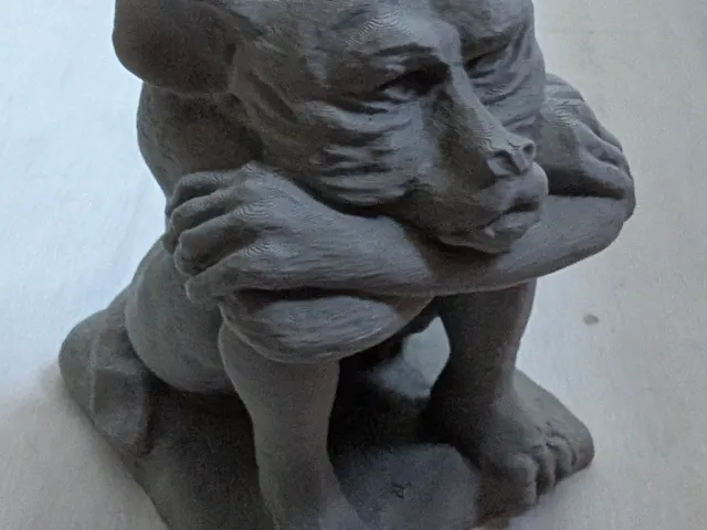 Grotesque statue