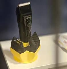 Universal beard trimmer holder