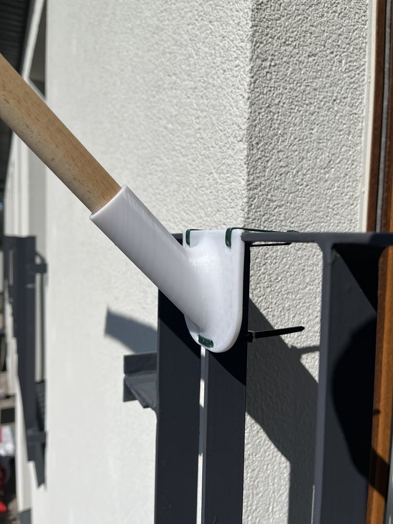 Balcony flag holder