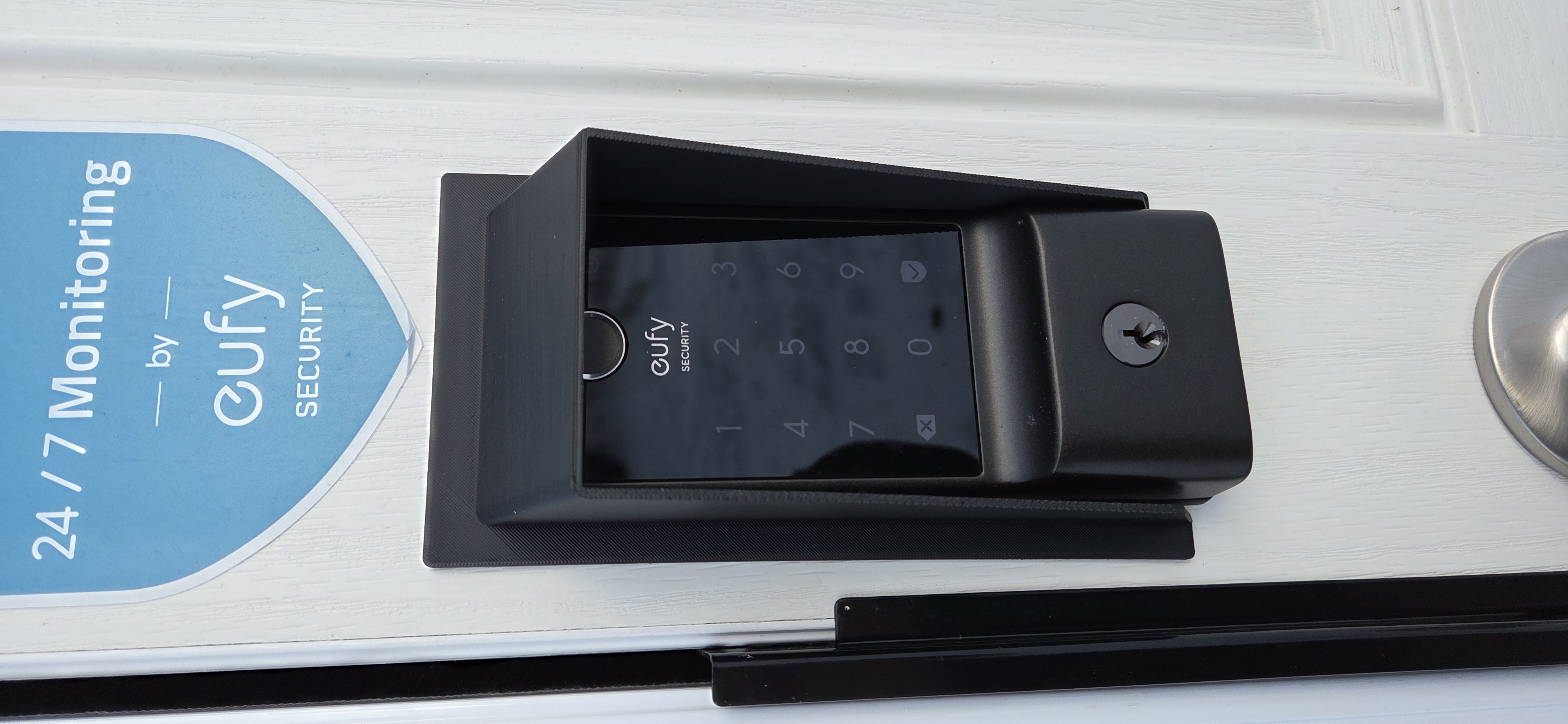 Eufy C220 lock rain shield