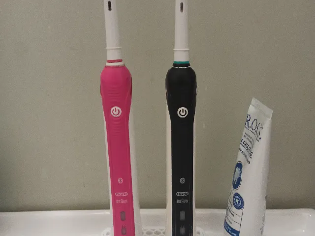 Two Oral-B Toothbrush Stand/Holder
