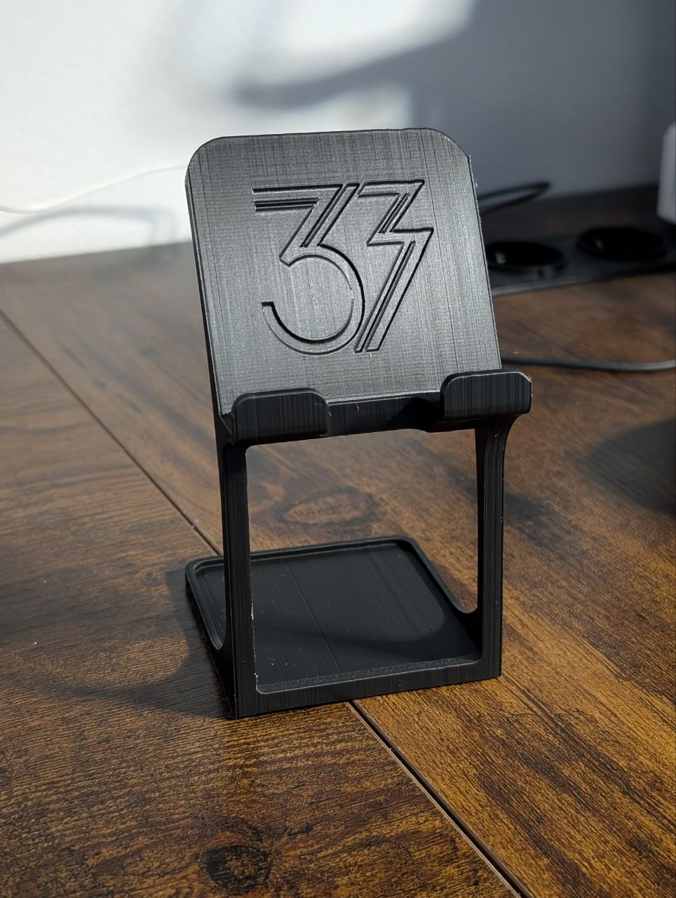 Expedition 33 Desk Phone Holder