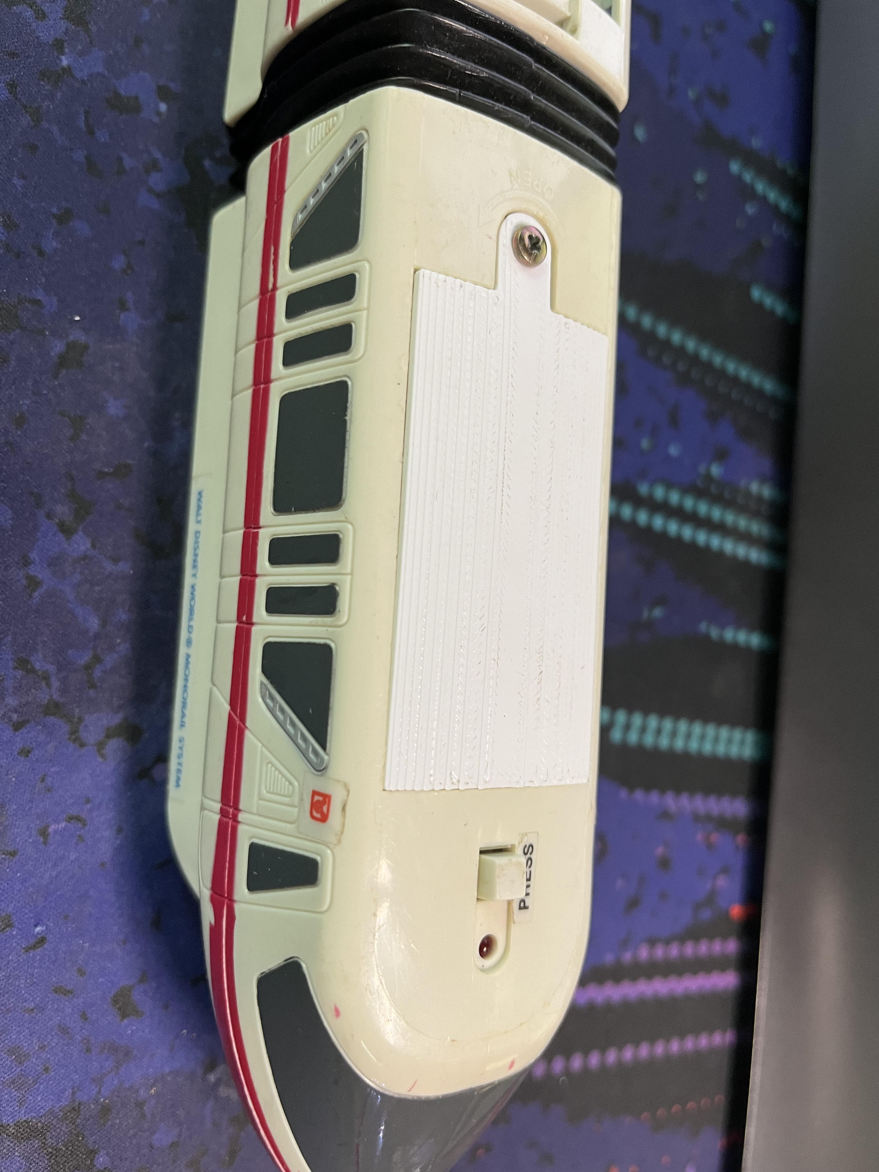 Disney Monorail Battery Door