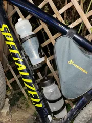 bottle/cargo cage adapter/relocator/extender