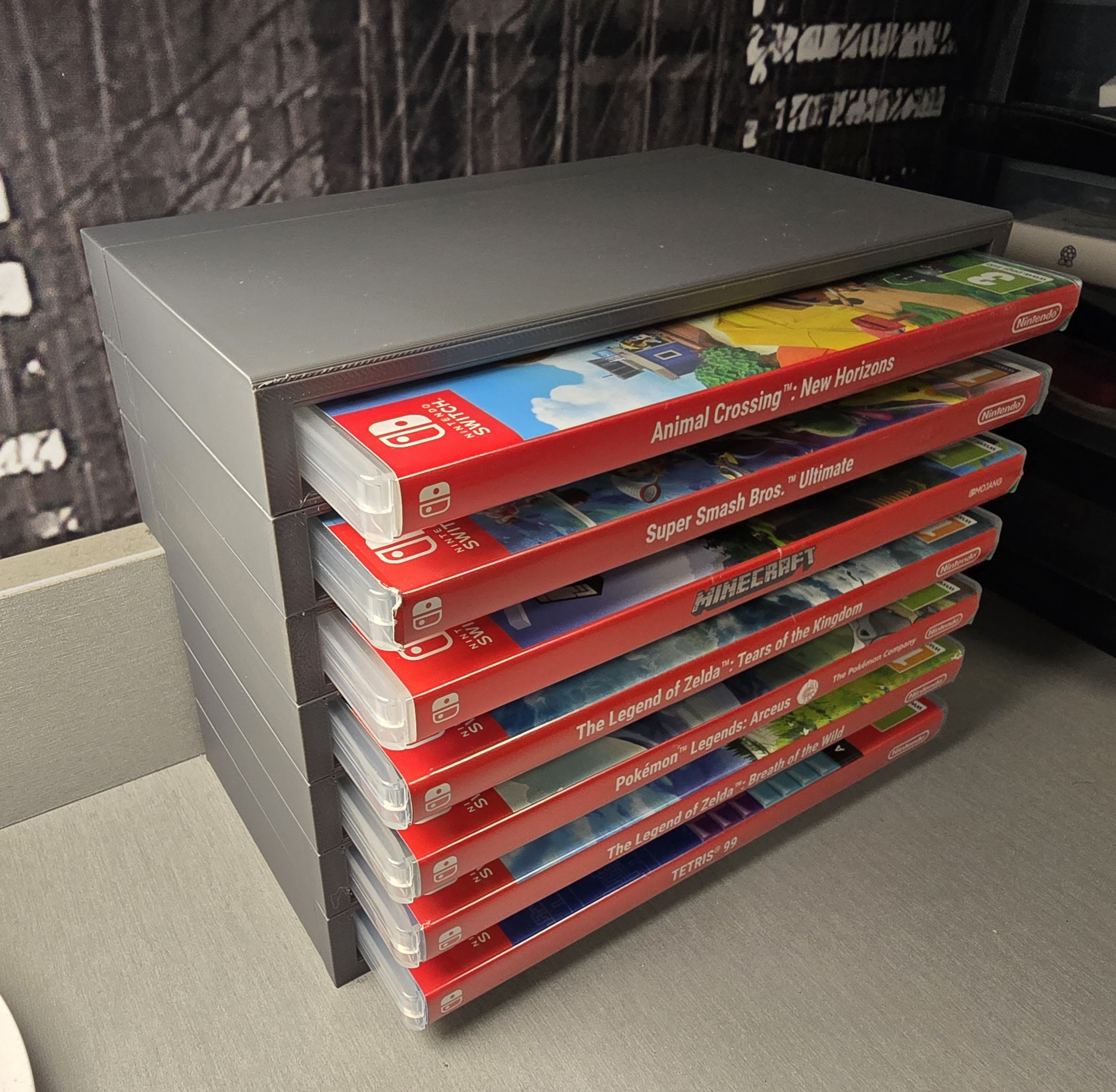 Shelf-like stand for switch game covers