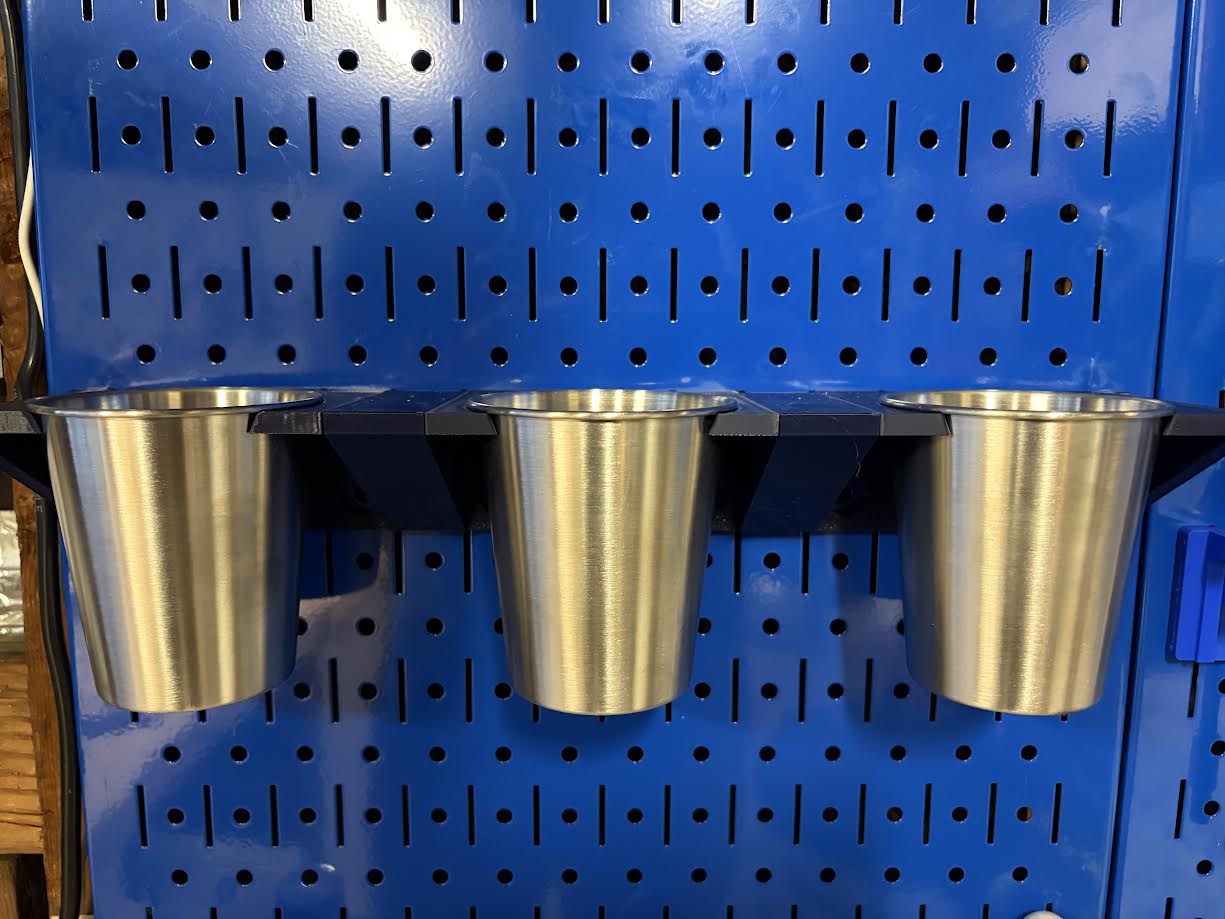 A cup holder to keep your tools organized for the DDD Printable Wall Control system