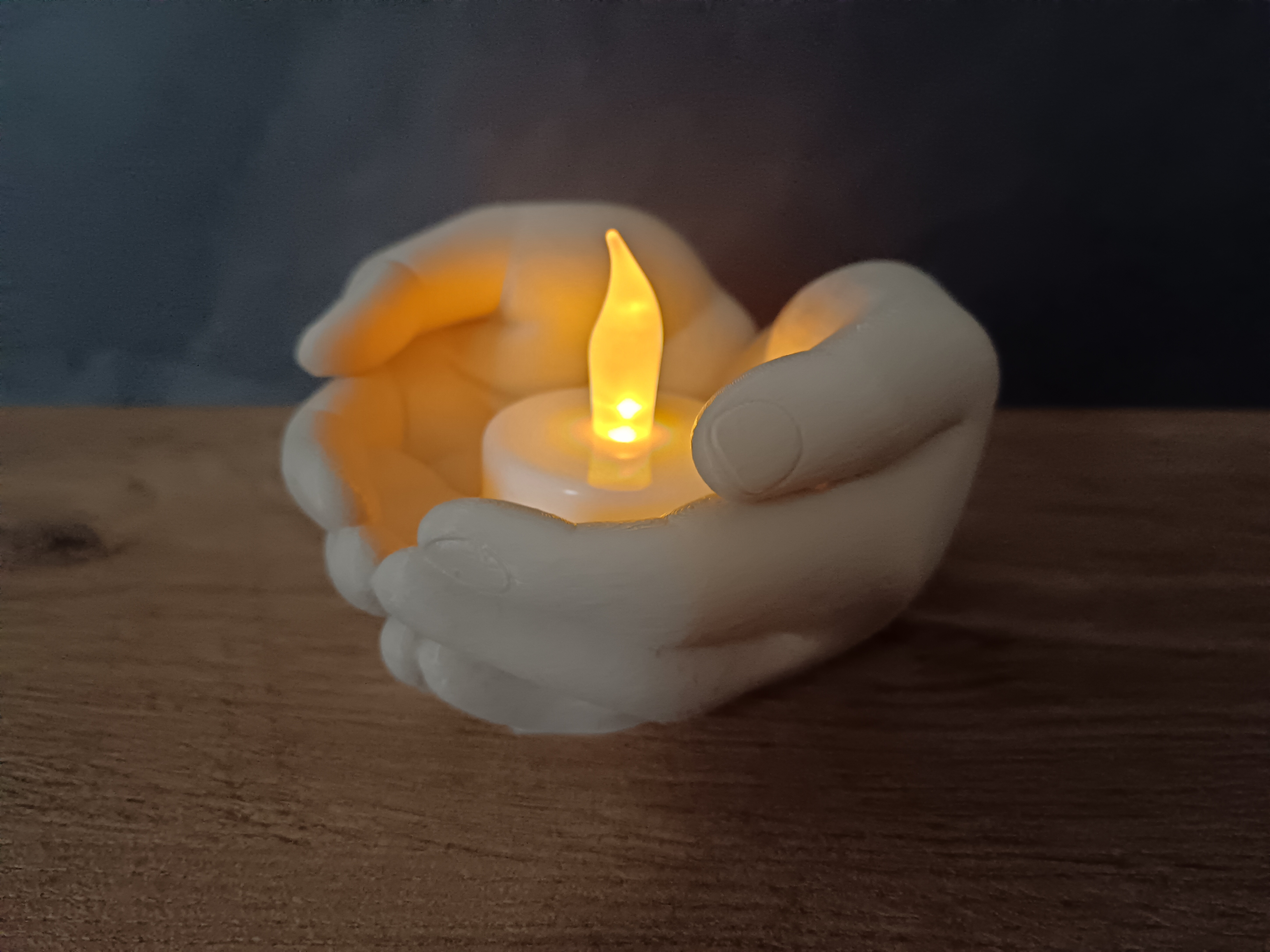 Palms on a tea light