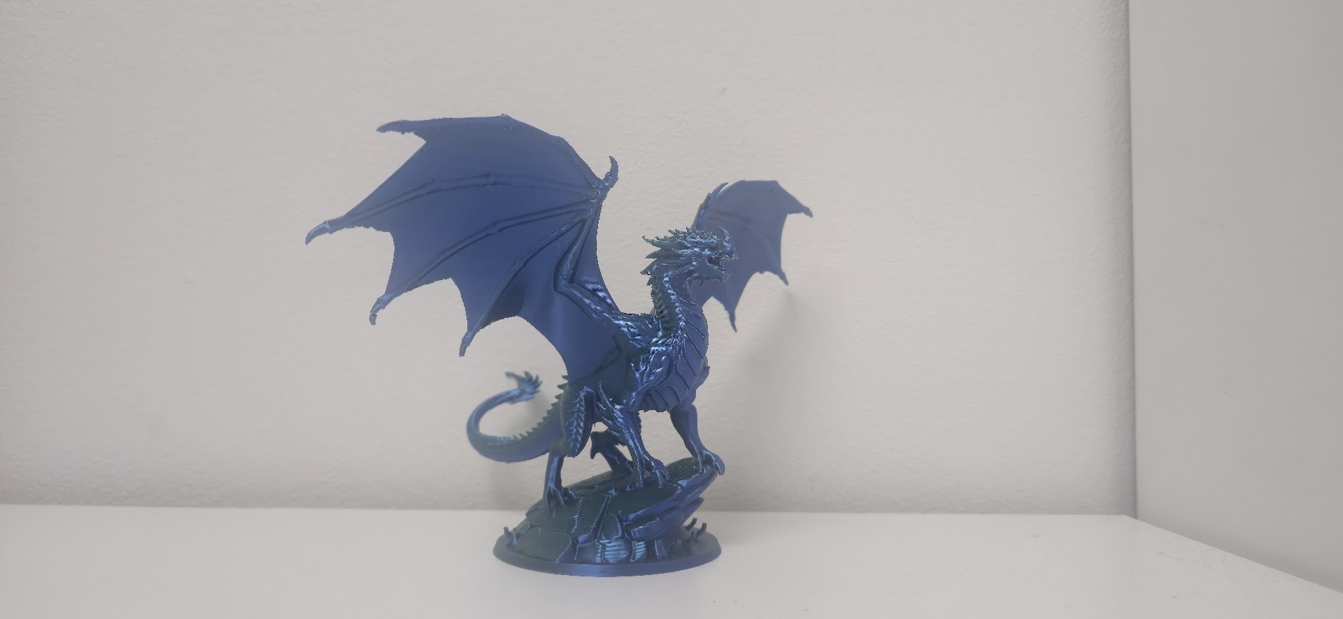 Majestic Blue Silk Dragon on Rock