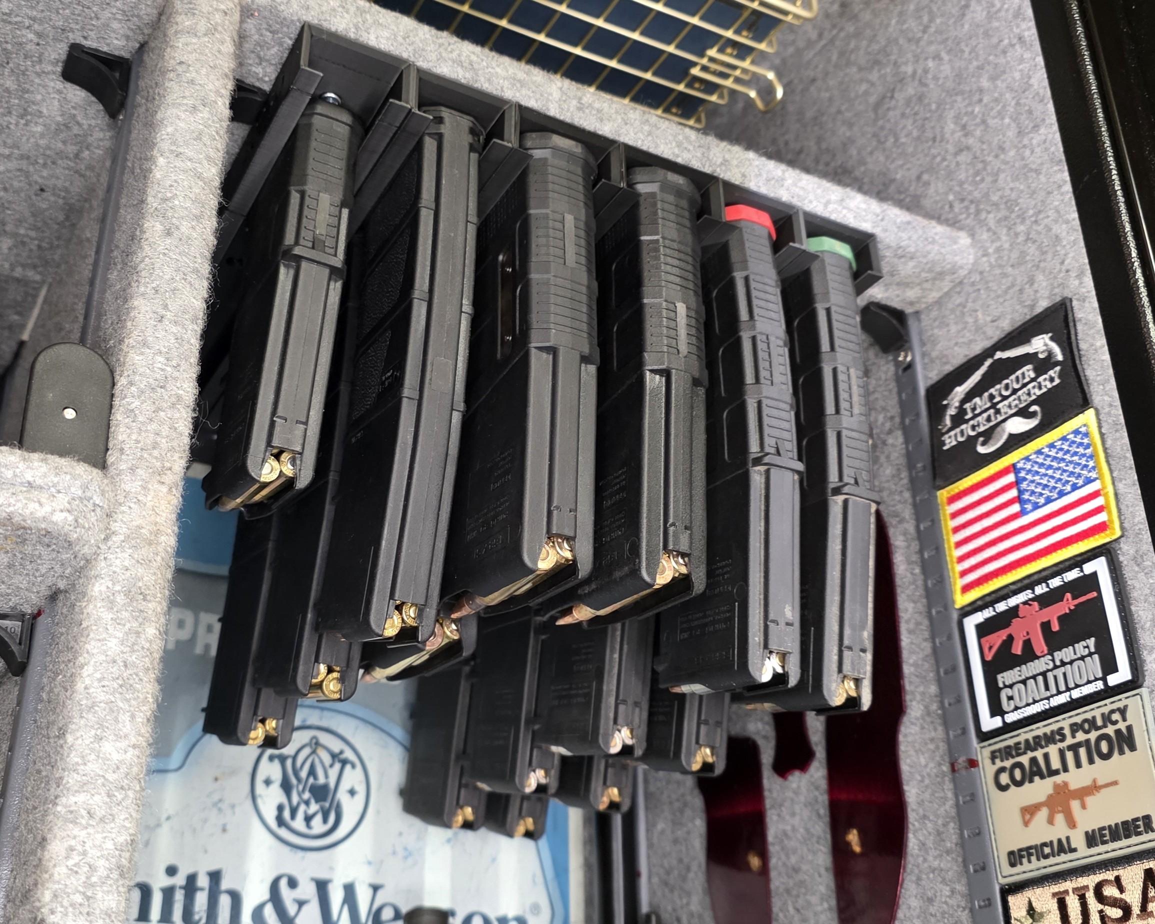 Under shelf magazine holder/rack